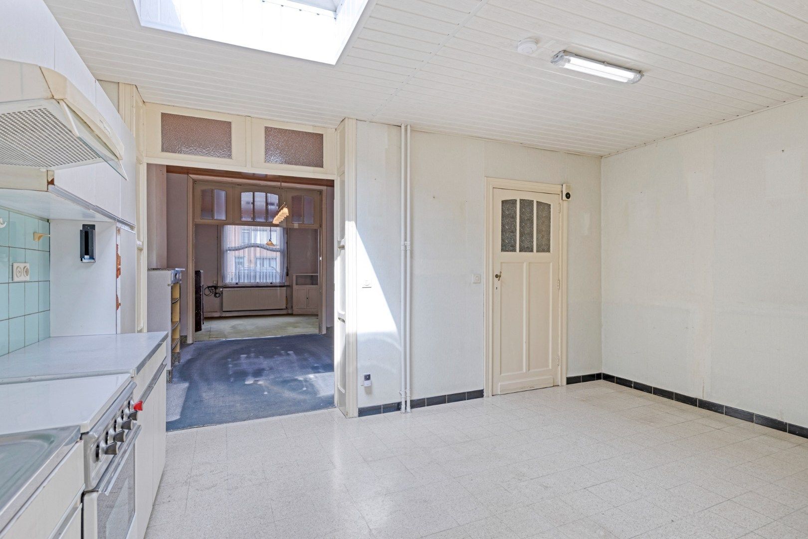 Te renoveren woning met 4 slaapkamers, garage en tuin in Kessel-Lo – EPC 906 kWh/m² - bewoonbare opp. 163 m² foto 8
