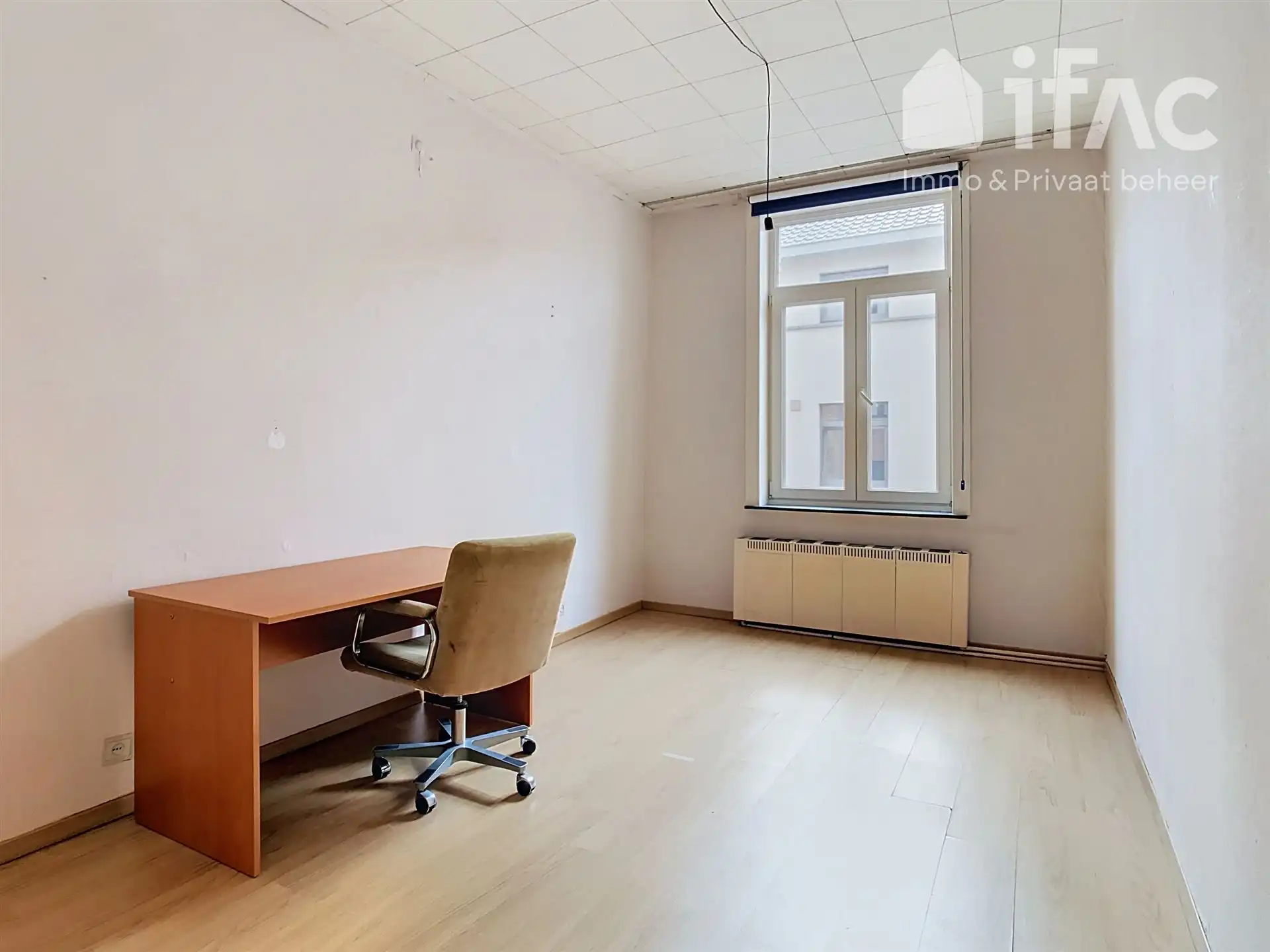 Te renoveren woning met ex-praktijk in centrum Overijse foto 18