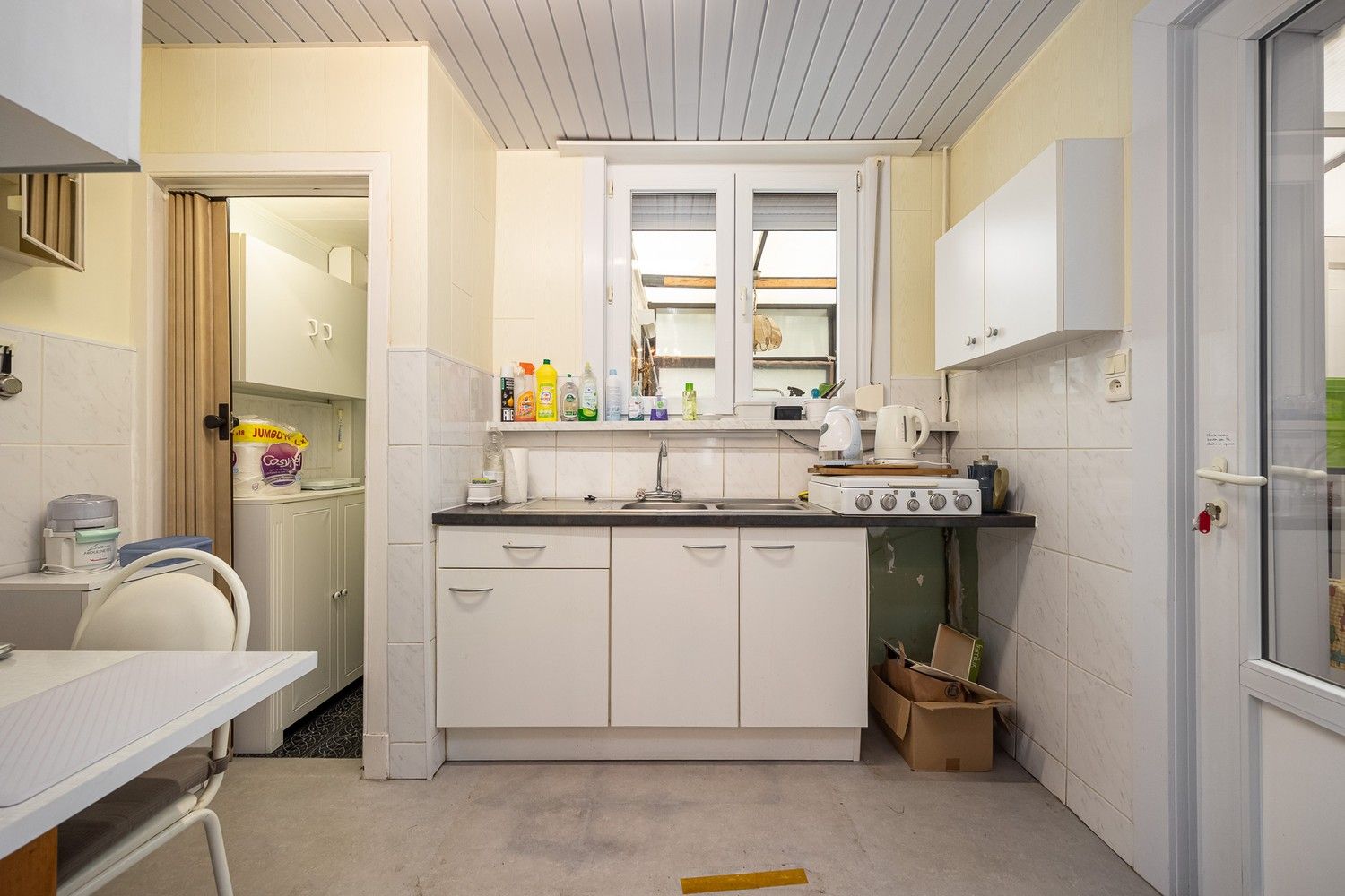 Te renoveren opbrengsteigendom met 3 éénslaapkamerappartementen nabij het Boekenbergpark foto 4