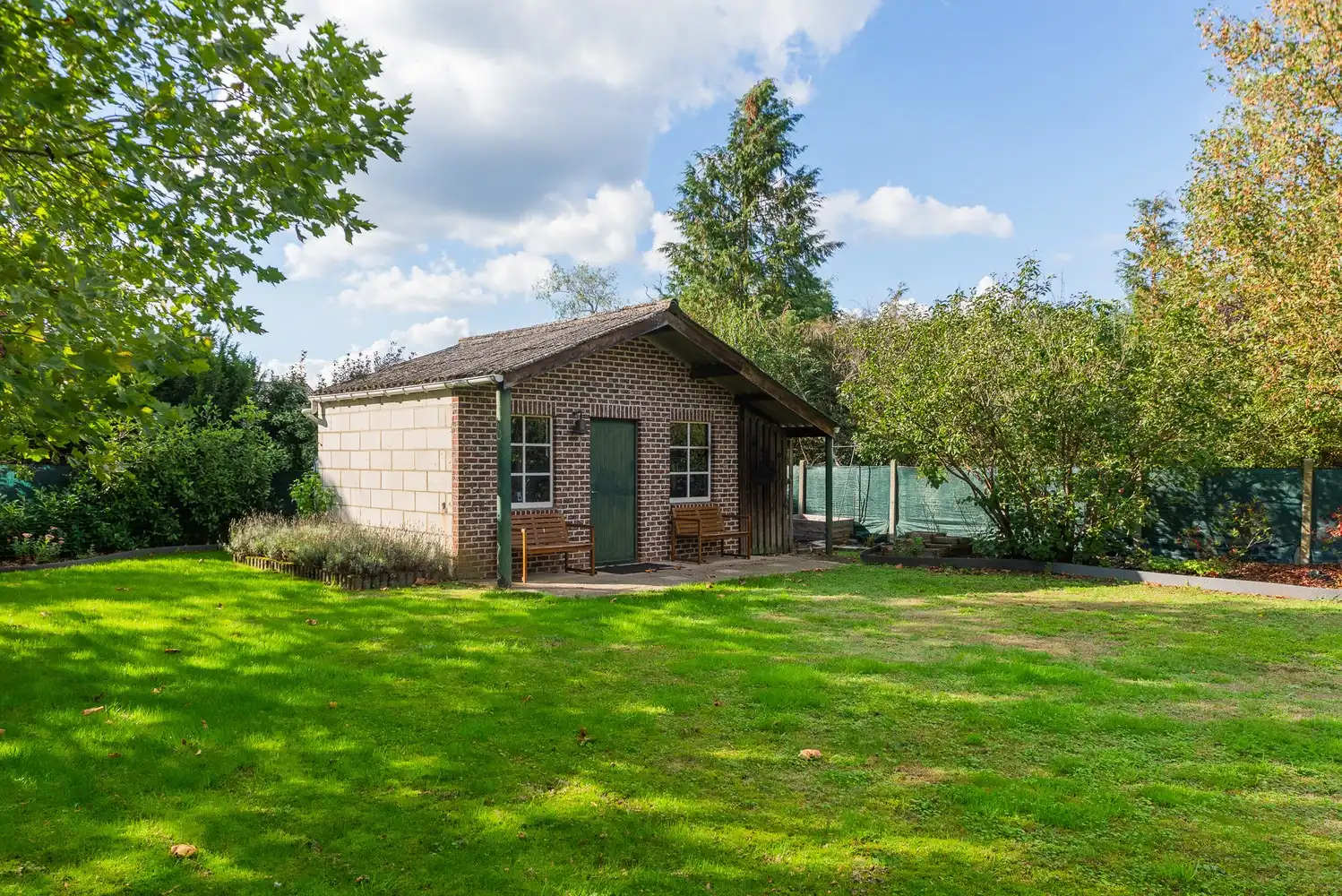 Ruime en uitstekend onderhouden gezinswoning met prachtige tuin en inpandige garage op een perceel van 1.490 m² foto 34