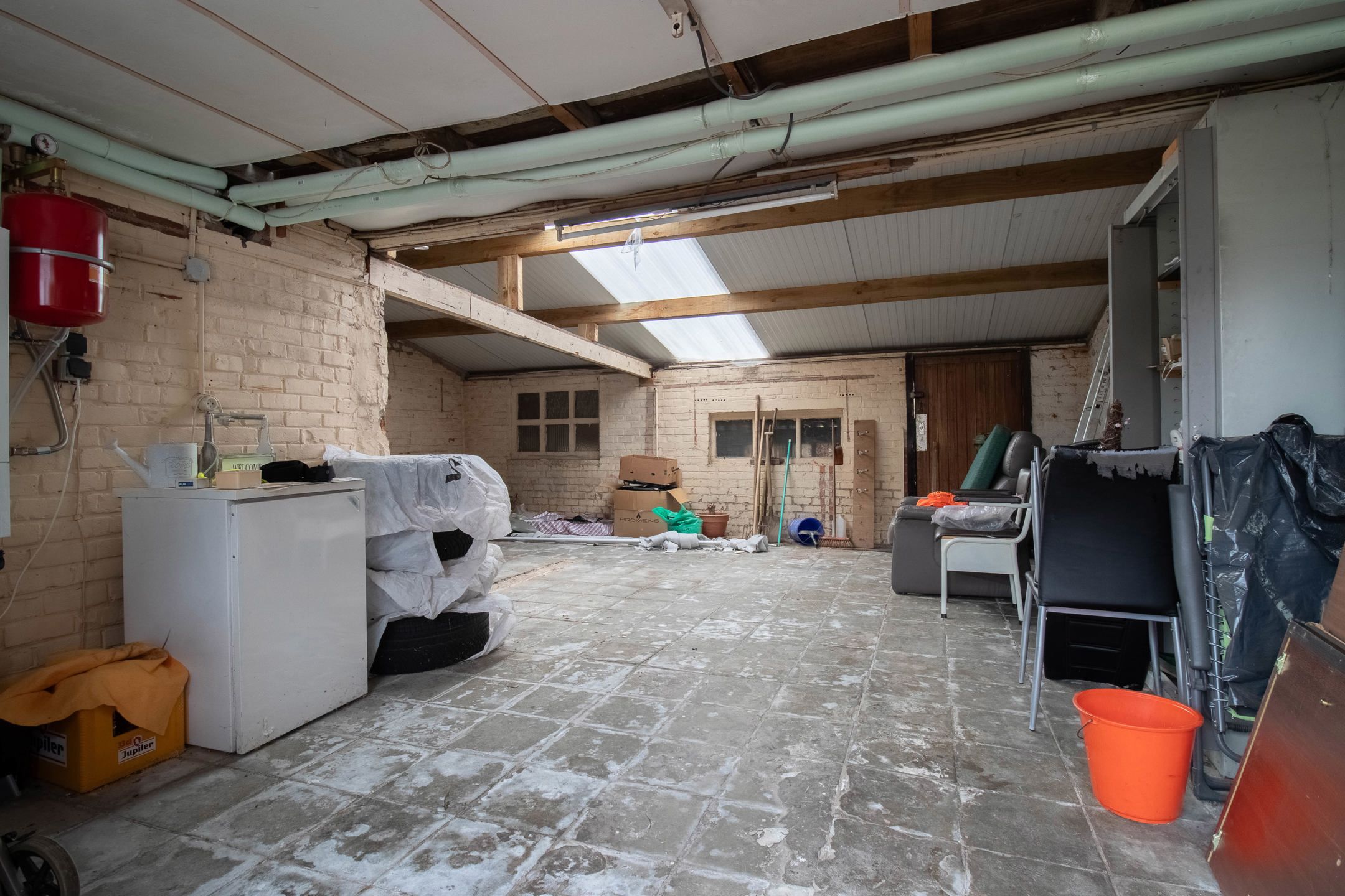 Charmante 3-gevelwoning met ruime tuin en garage foto 27