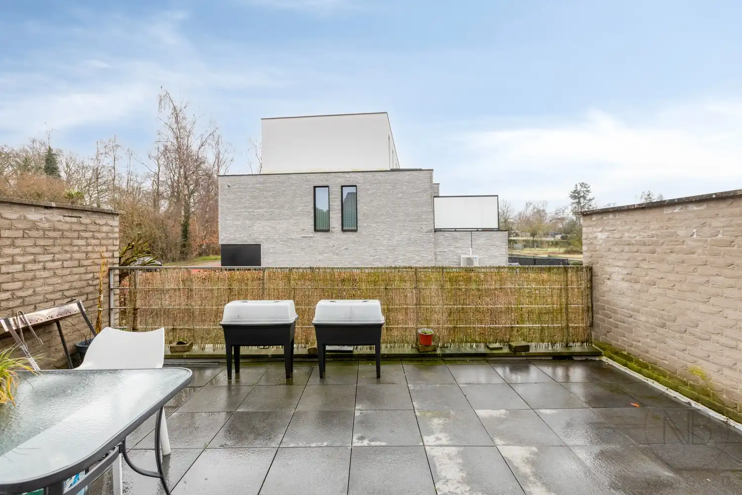 Ruim duplex appartement met 3 slaapkamers en groot terras in hartje Zutendaal foto 4