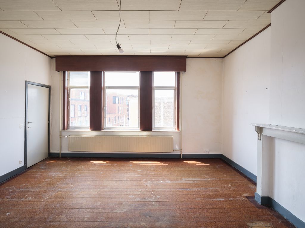 Atelier/loods met te renoveren woning, ruime tuin en bijzonder veel potentieel op een boogscheut van het stadscentrum. foto 13