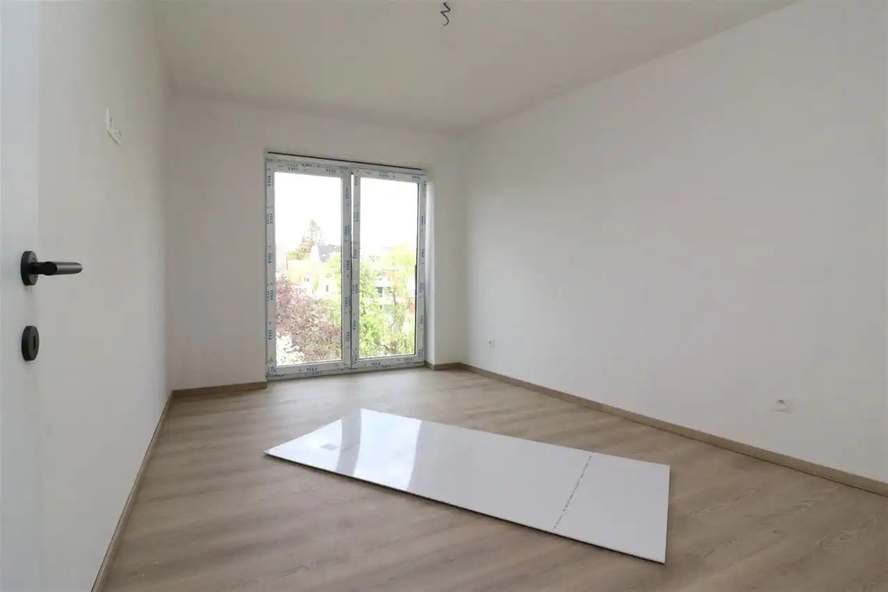 Uniek penthouse in centrum Aarschot met 1 slpk. parking en terras foto 9