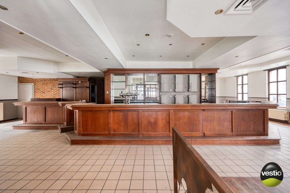 Handelspand met woonst / projectopportuniteit aan de Luikersteenweg. foto 5