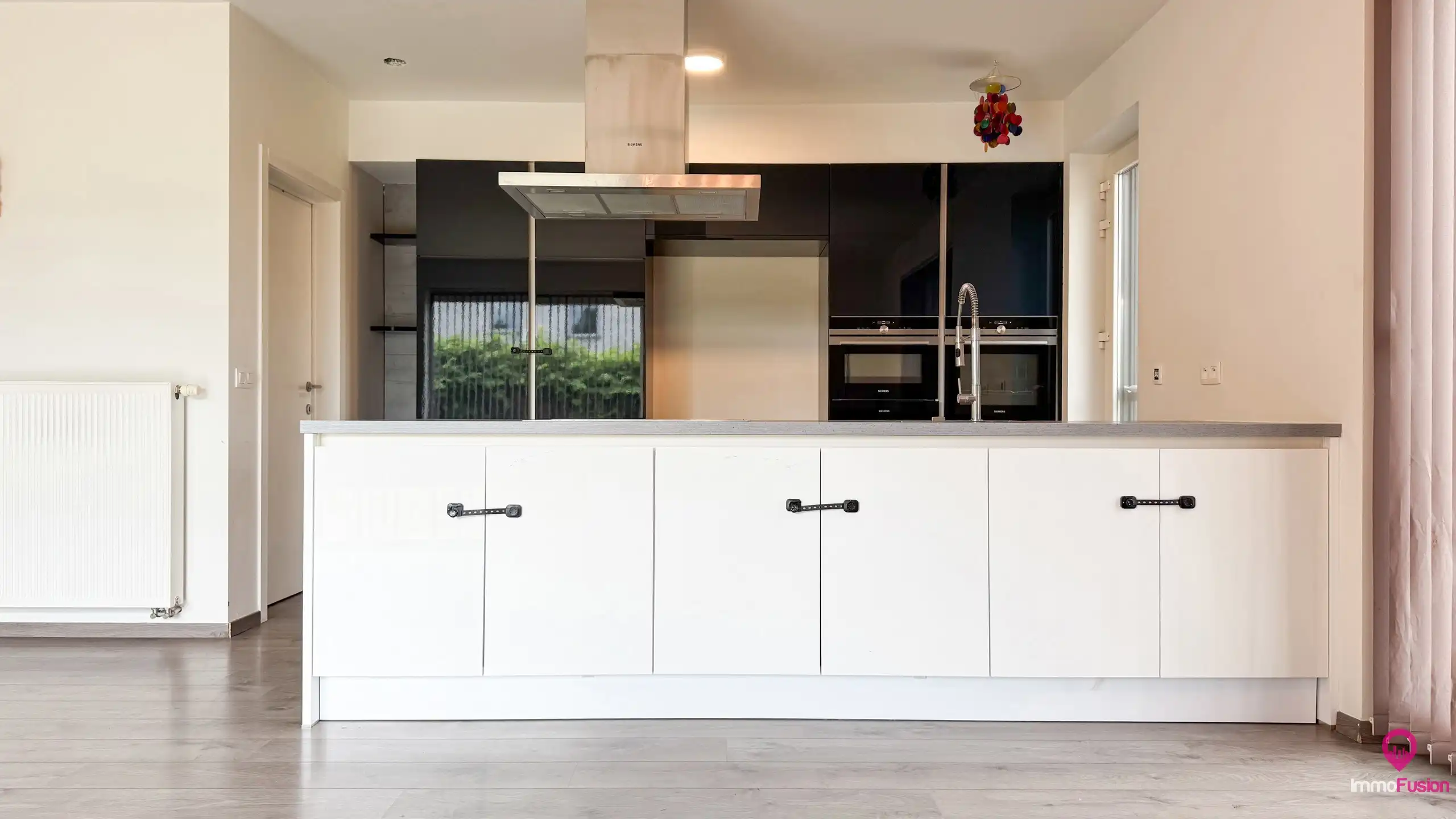 Recente halfopen woning met 3slpks, veranda en ruime tuin! foto 11