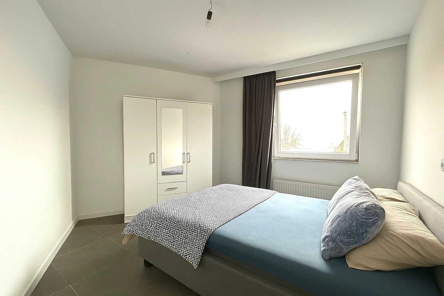 INSTAPKLAAR EN ENERGIEZUINIG APPARTEMENT MET 2 SLPKS | 2 TERRASSEN EN GARAGEBOX foto 5