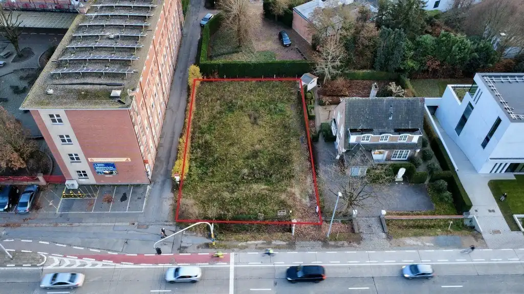 Commercieel gelegen bouwgrond voor standalone kantoorgebouw te koop in Gent foto {{pictureIndex}}