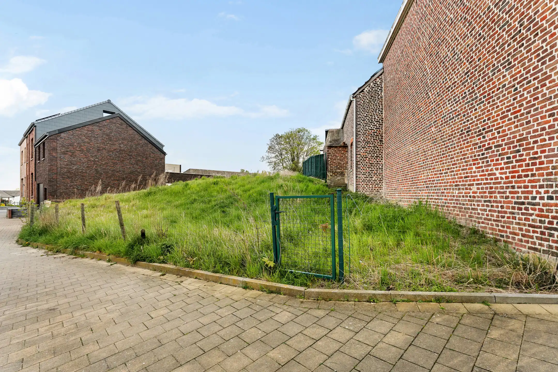 Zuidoost georiënteerde bouwgrond te Herderen foto 2