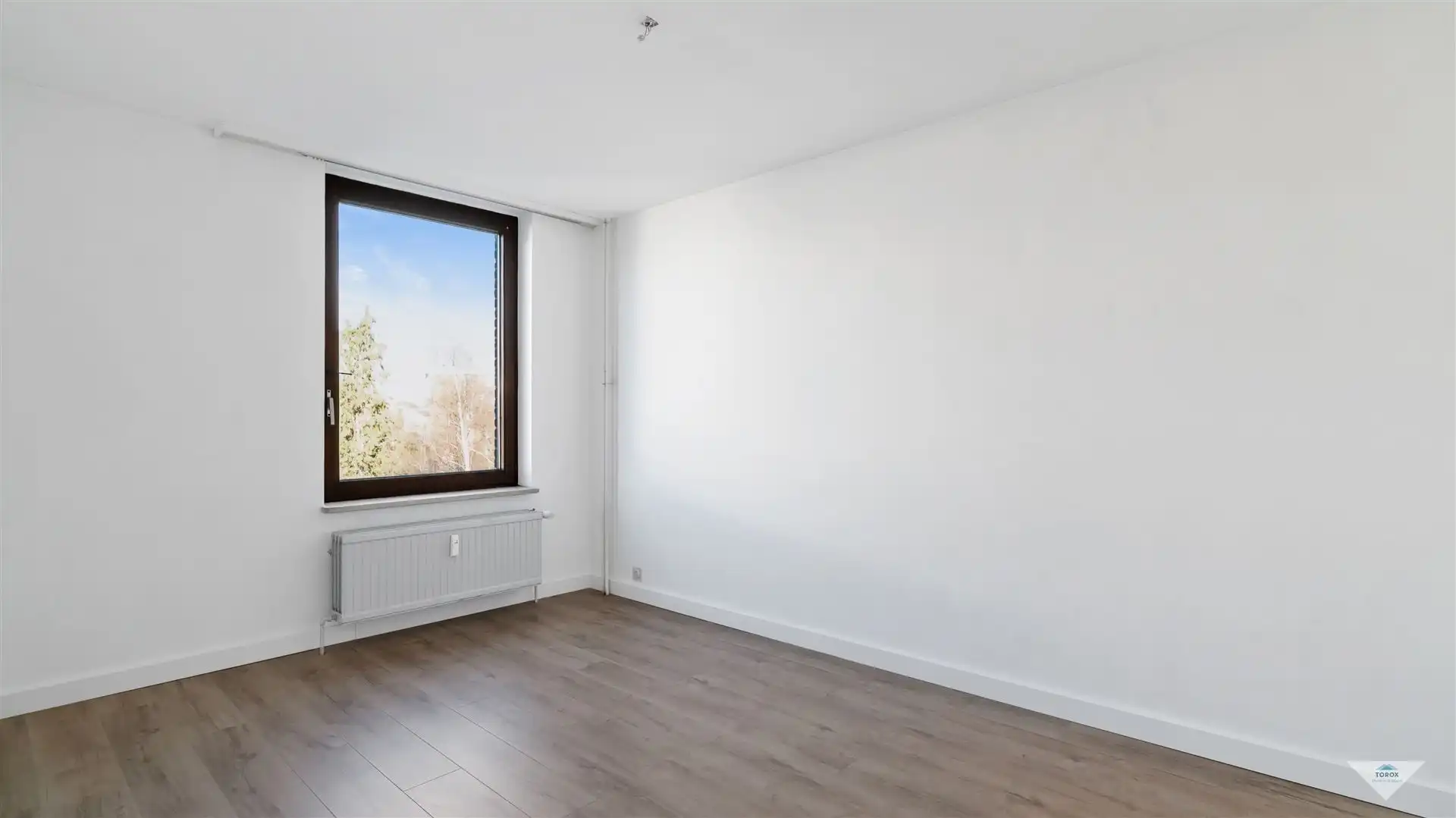 Lichtrijk appartement met garagebox foto 7