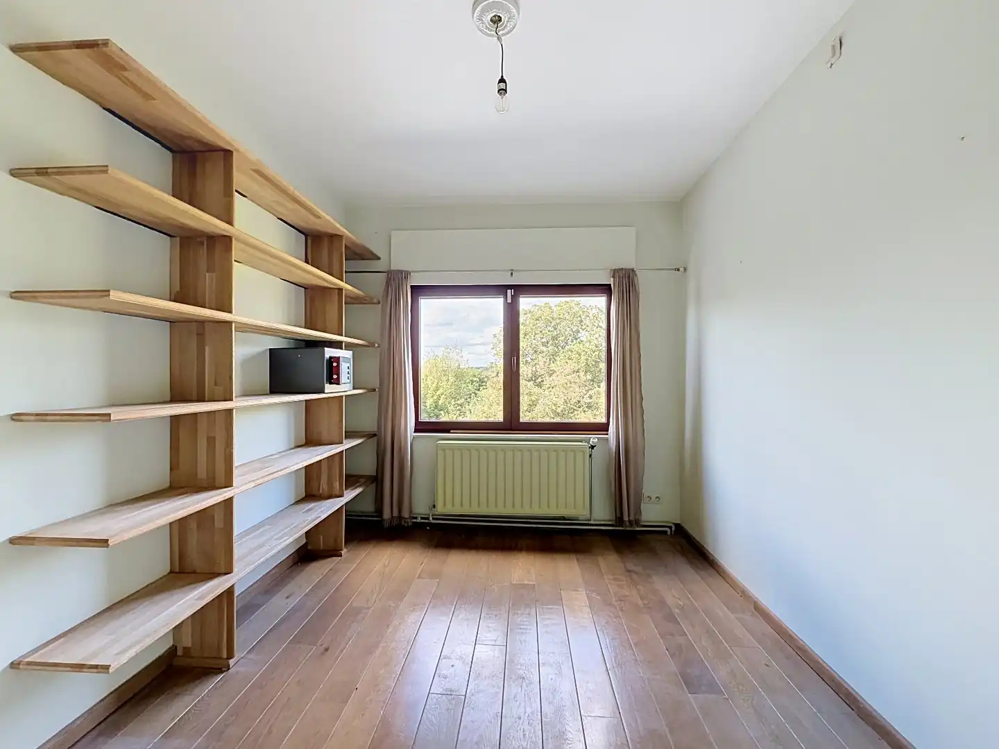 Ruime bel-etagewoning met 4 slaapkamers en grote zuidoostgerichte tuin in Leuven foto 13