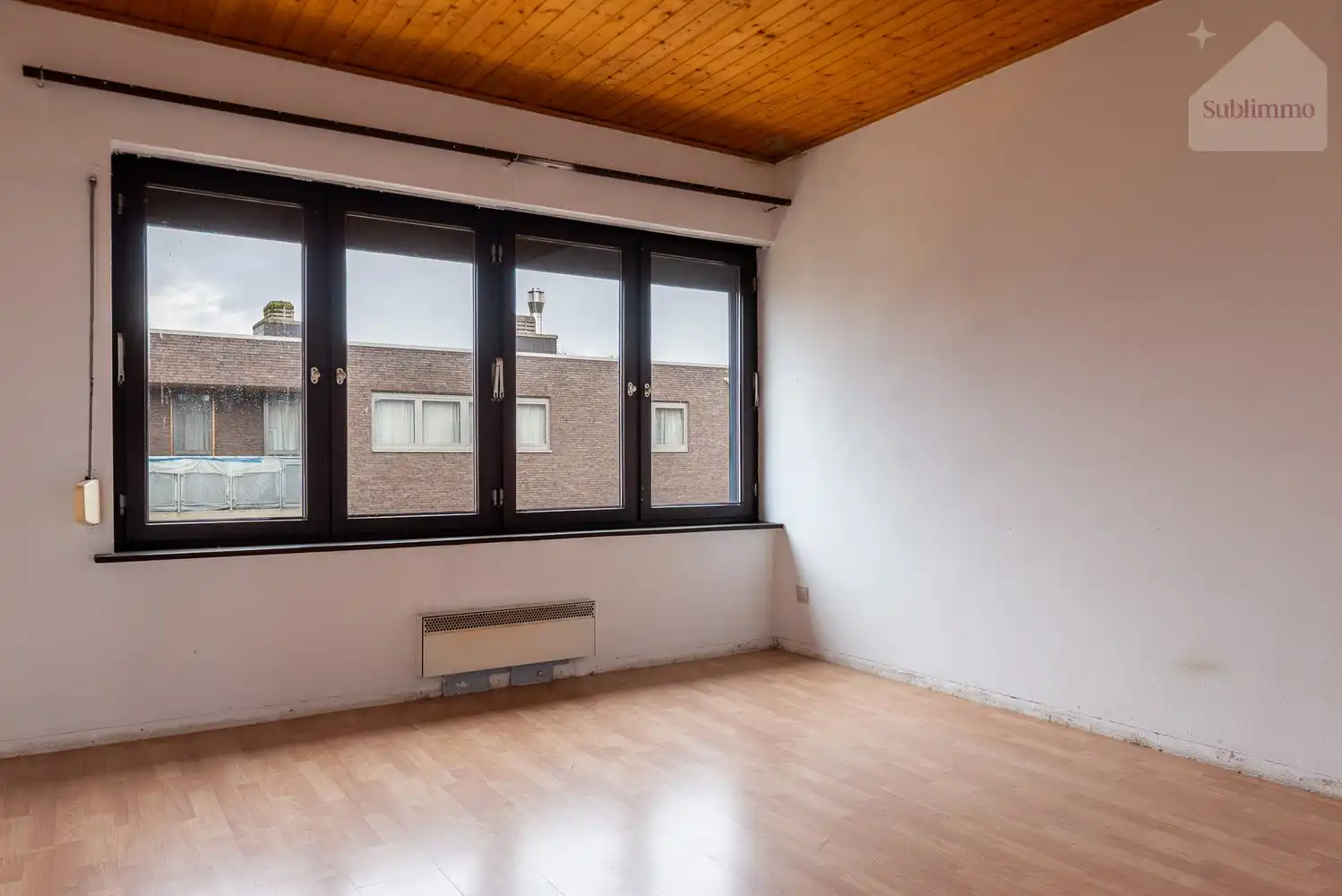 Opbrengsteigendom met 2 appartementen, tuin en garages te koop in Mol centrum foto 29