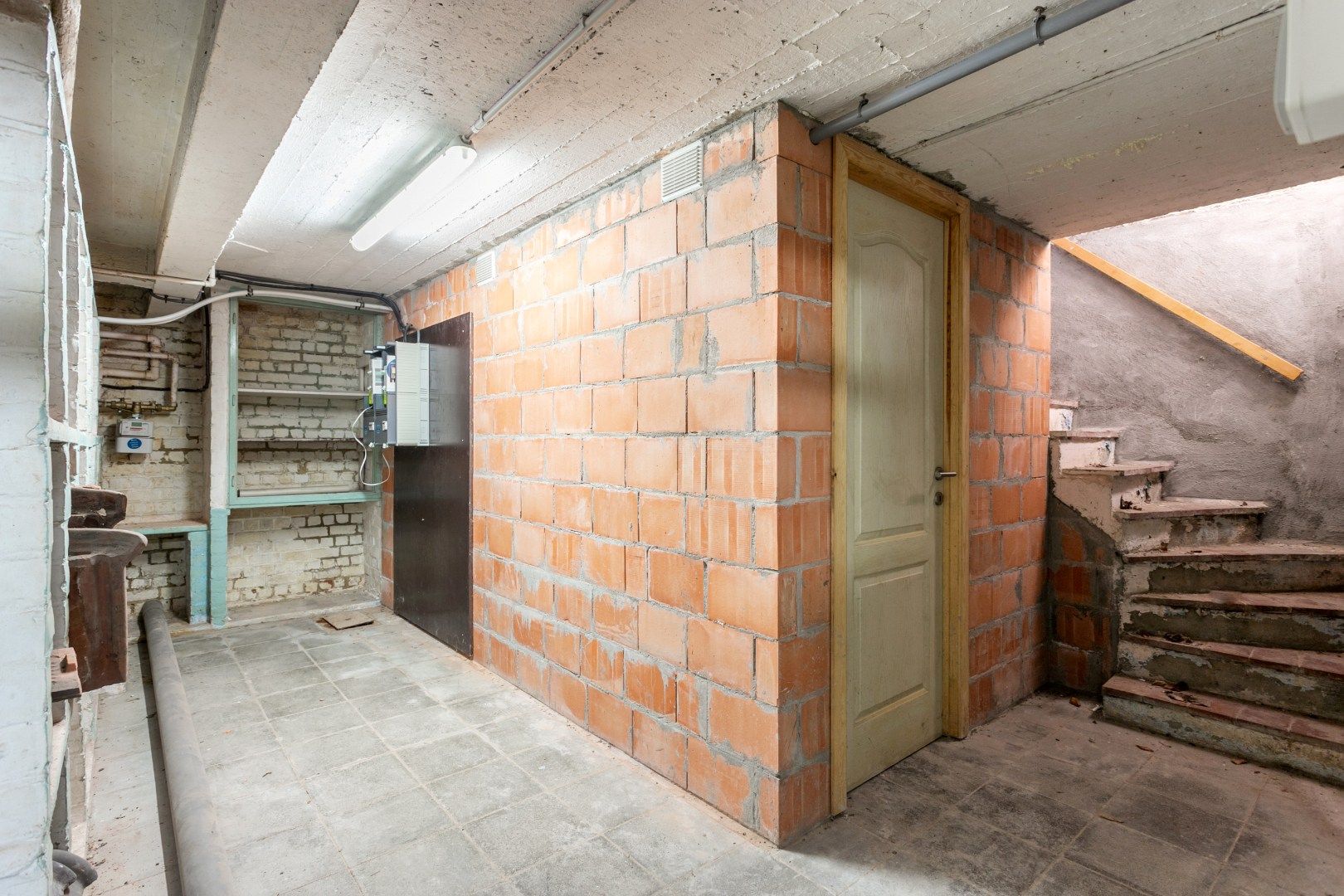 Ruim gelijkvloersapp te koop centrum Halle met 1 à 2 slpk, garage en tuin foto 16