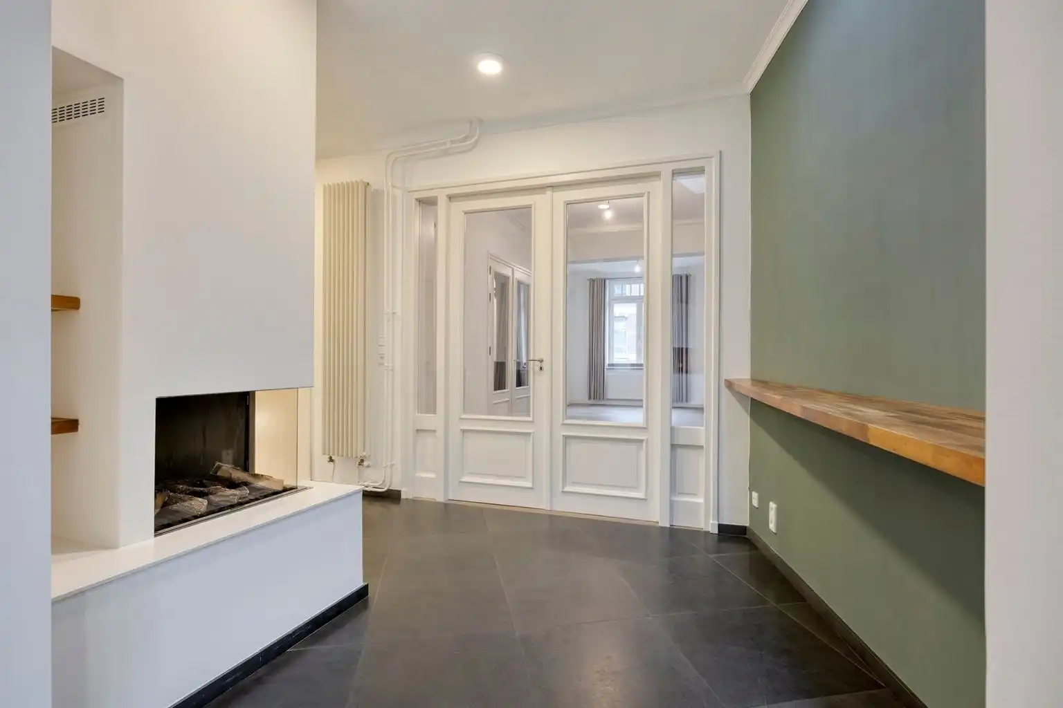 Prachtig gerenoveerde stadswoning met 3 slaapkamers en zuidgerichte tuin, op wandelafstand van het centrum van Maaseik. foto 7