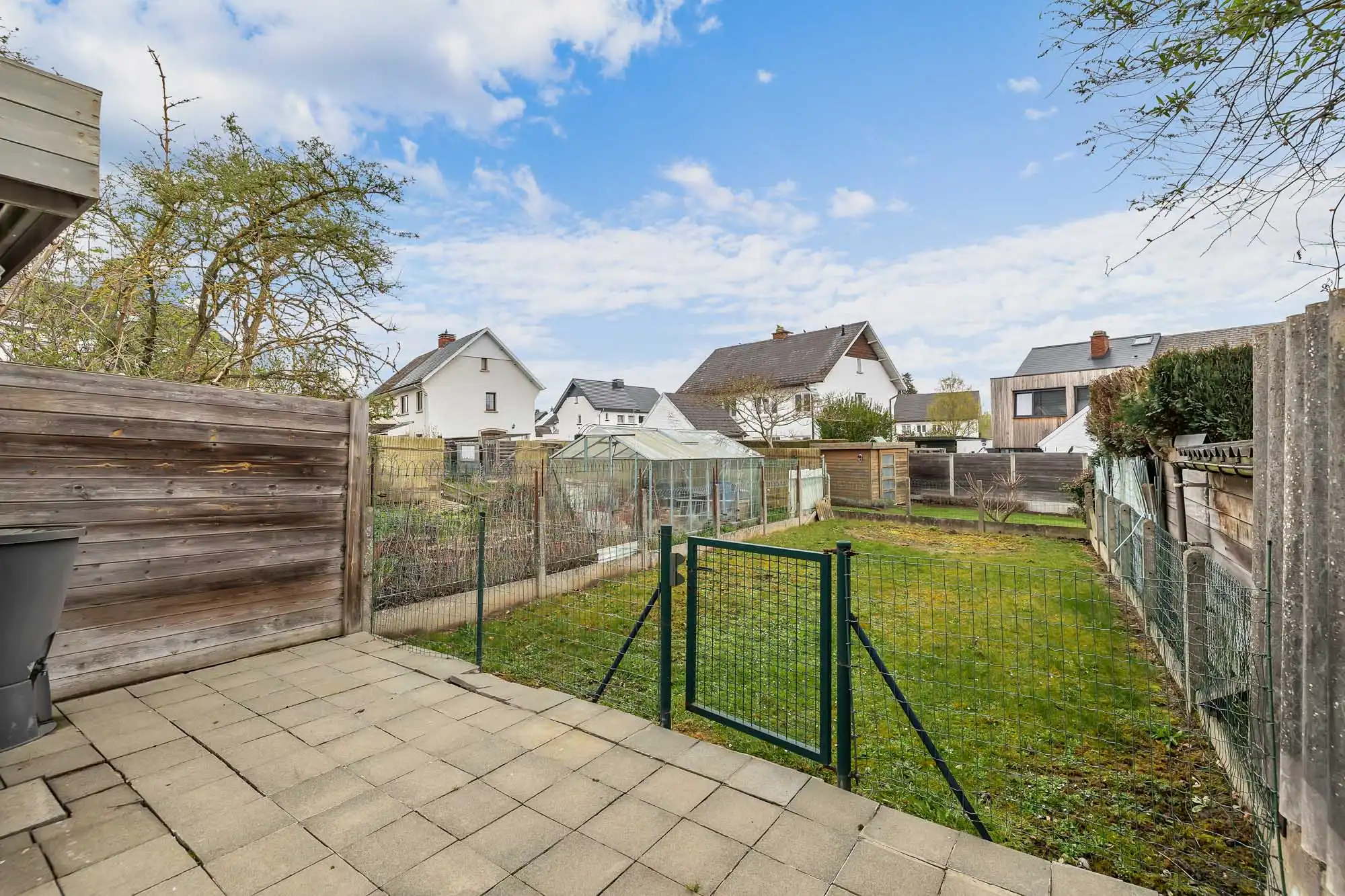 Halfopen bebouwing met garage en tuin in Ternat! foto 4