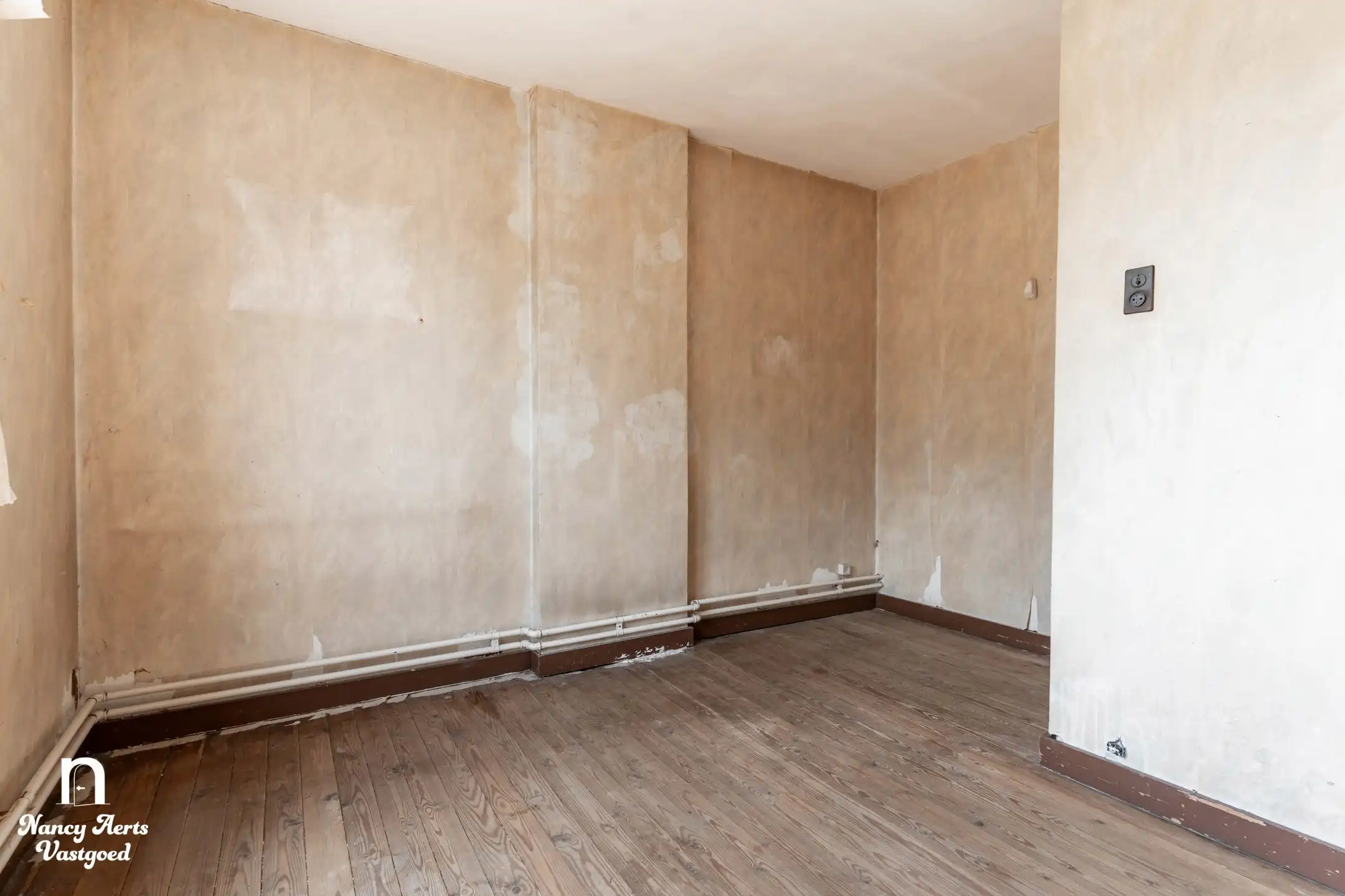 Karaktervolle renovatiewoning met tuin veel potentieel foto 9