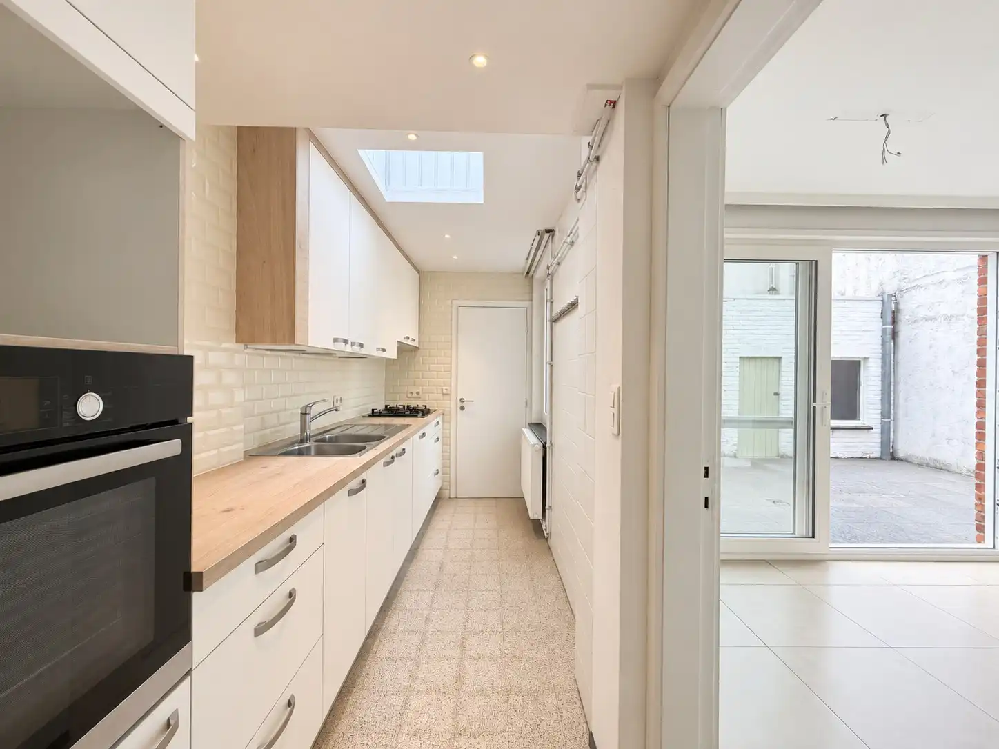 Toffe woning met mini-garage vlakbij Brugge-centrum foto 4
