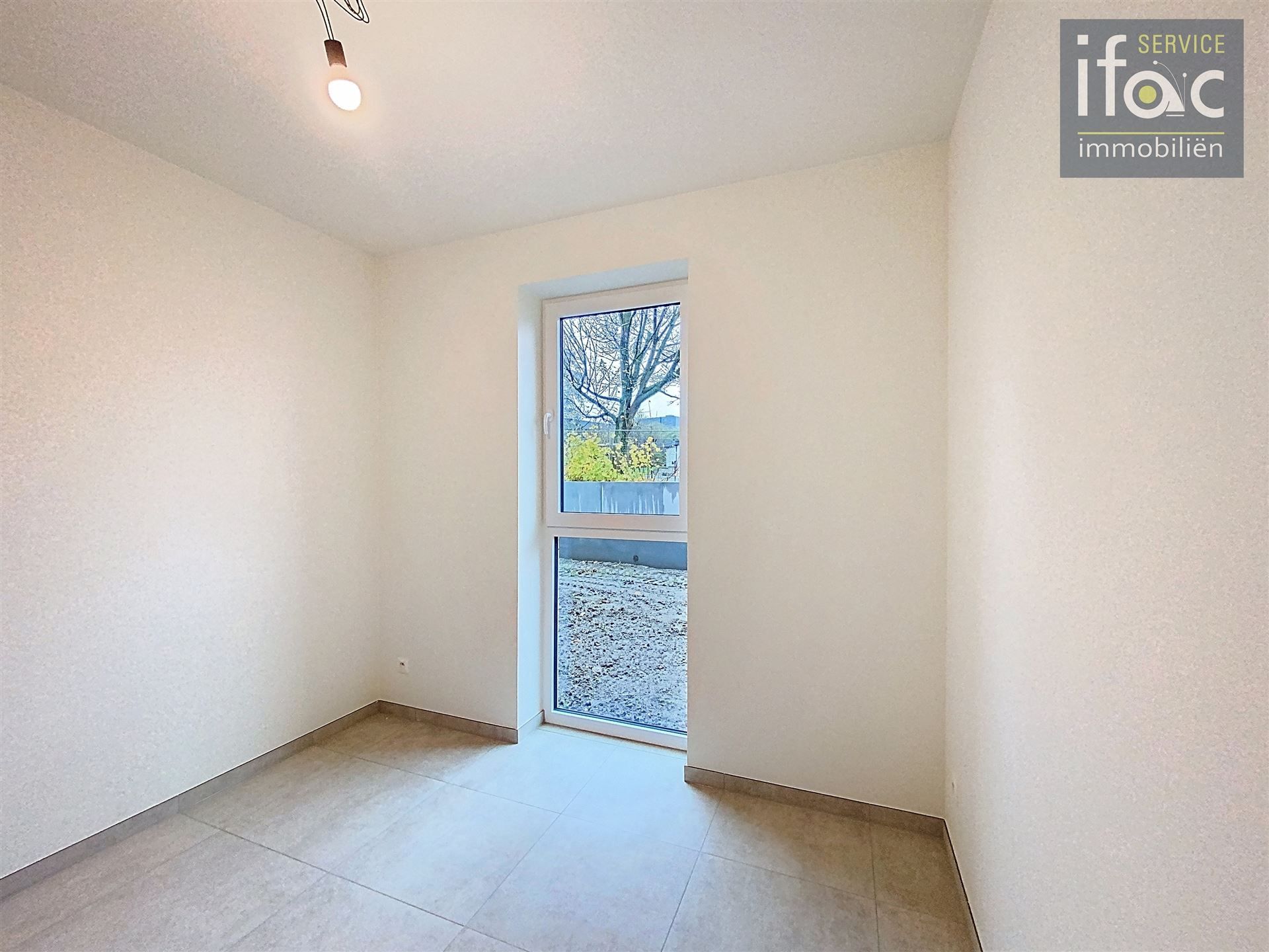 Nieuwbouw appartement met terras en ondergrondse staanplaats foto 9