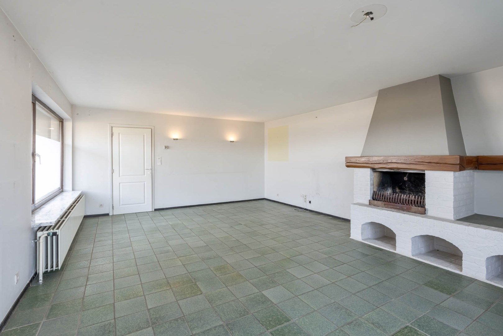 Multifunctioneel gebouw bestaande uit een woning, een winkel en een magazijn/werkplaats gelegen op een rustige locatie te Voorshoven! foto 8