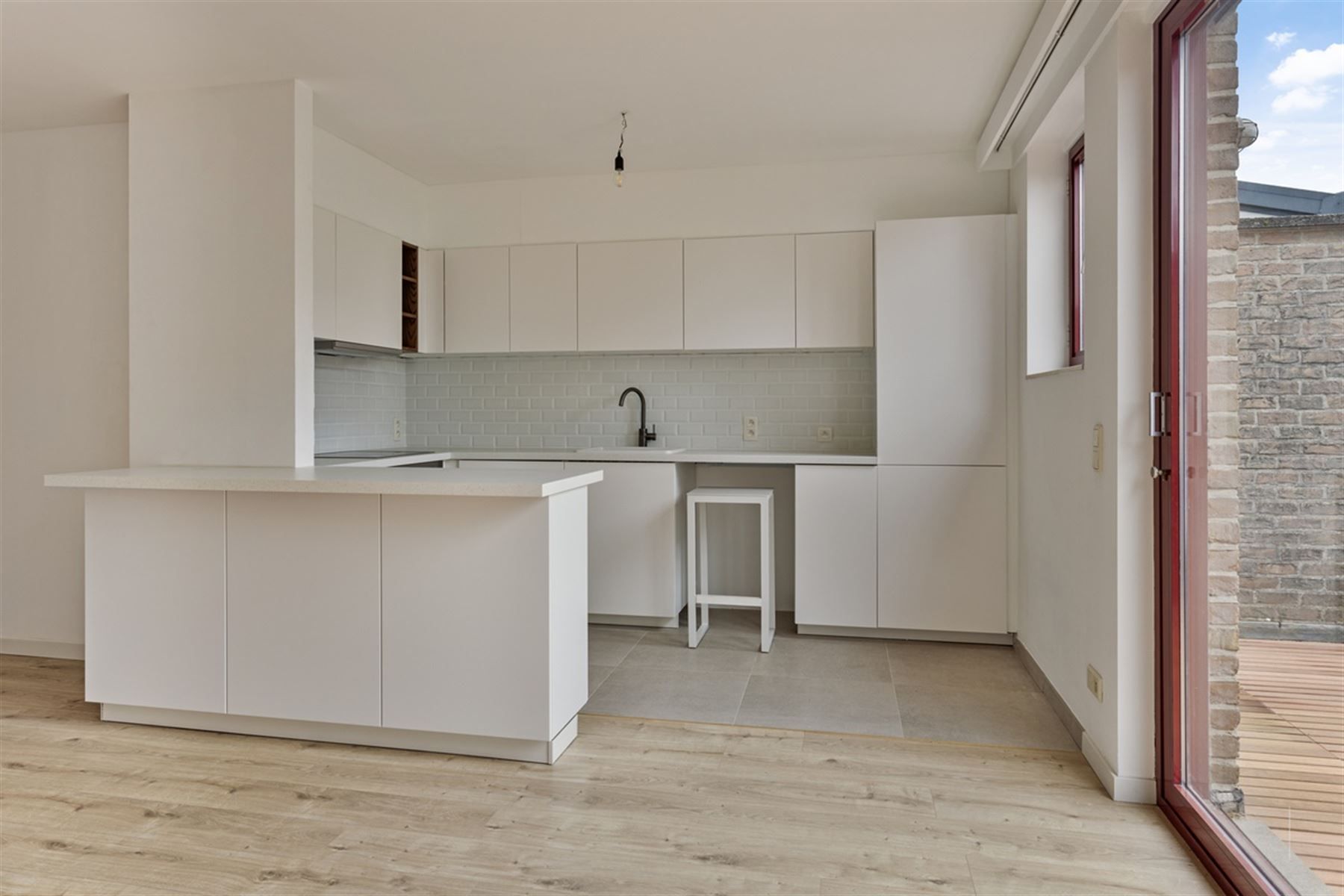 Gerenoveerd duplex appartement met drie slaapkamers foto 2