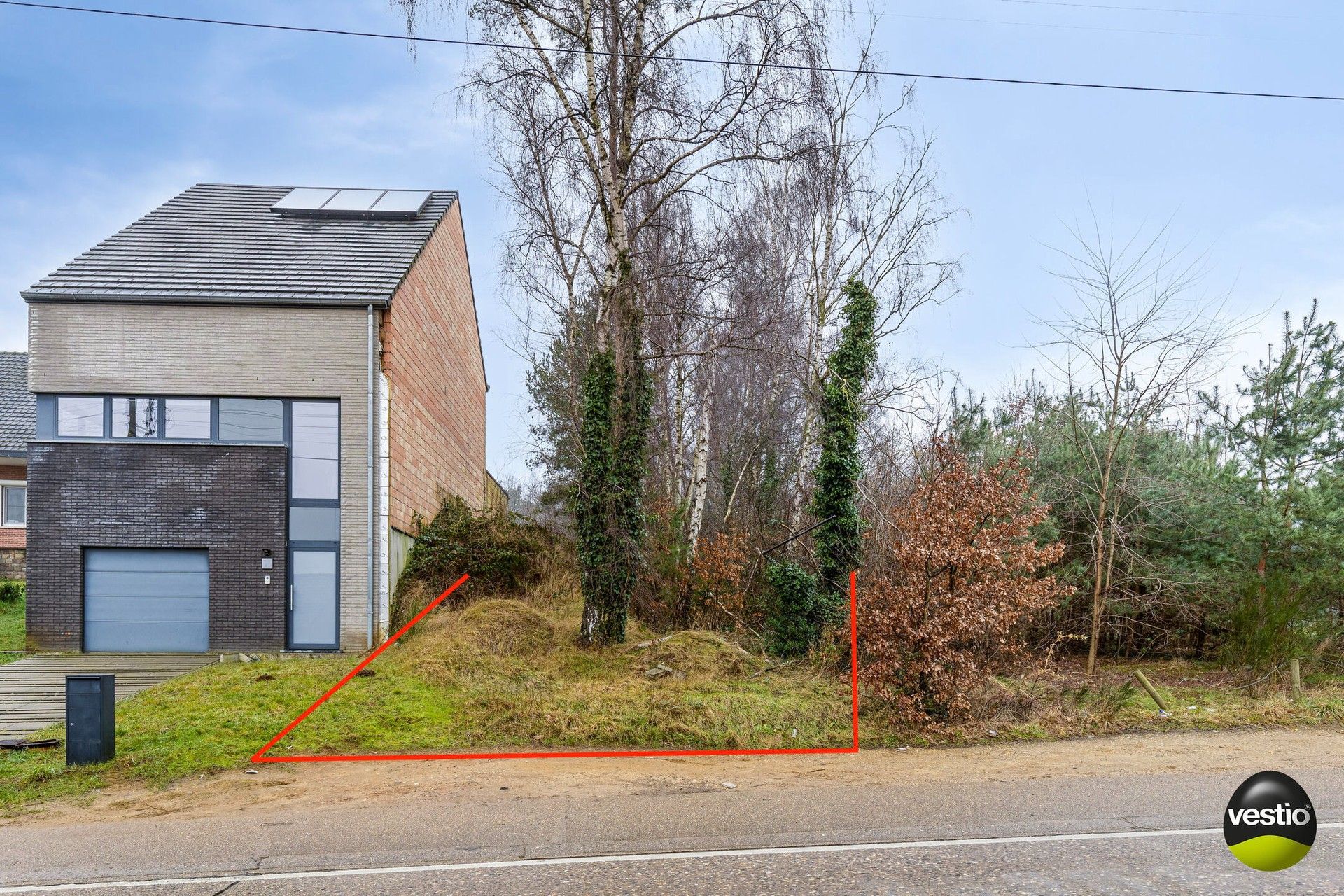 Bouwgrond halfopen bebouwing van 4a 64ca in Lummen foto {{pictureIndex}}