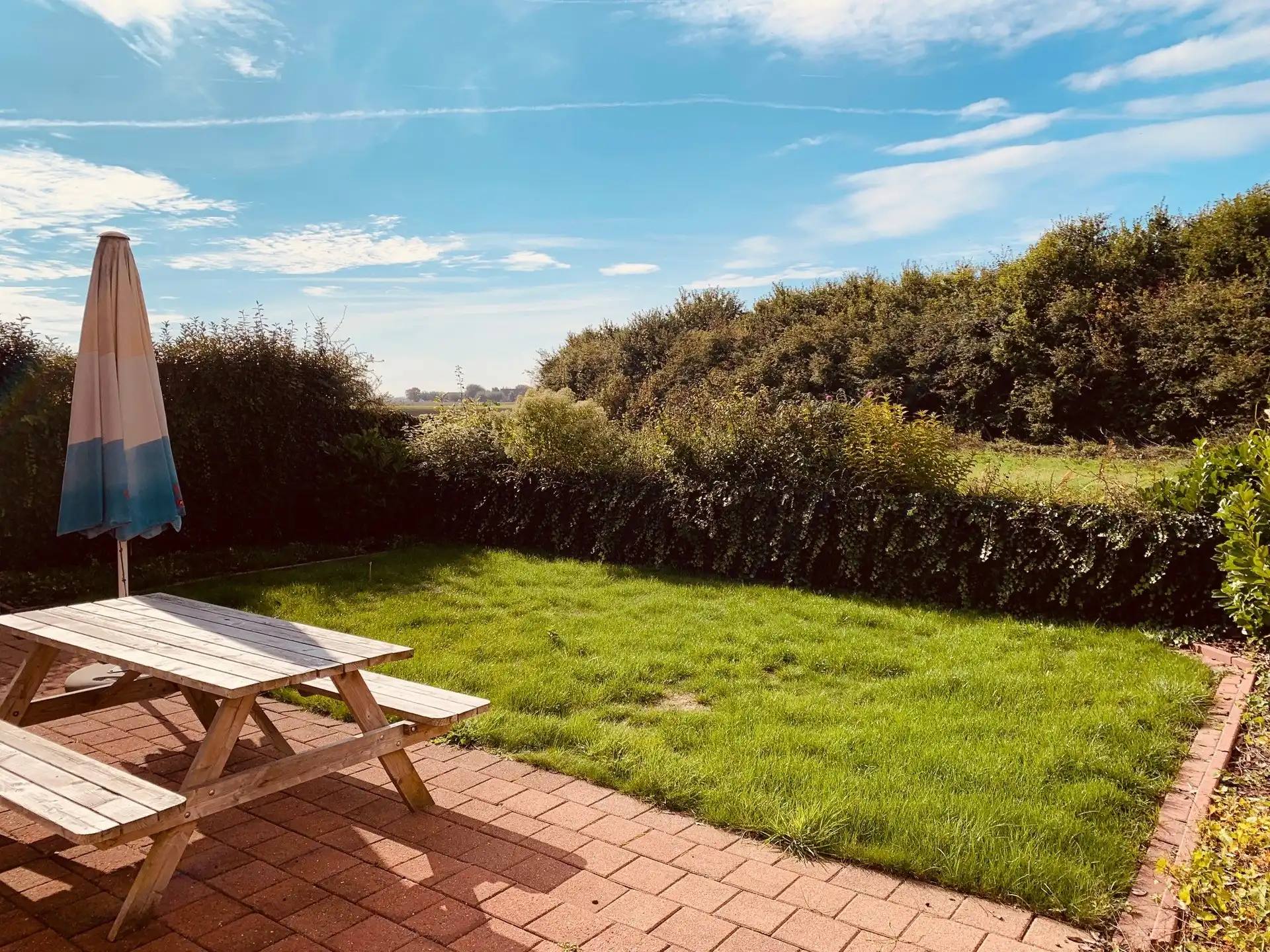 Charmante gerenoveerde visserswoning met zongerichte tuin en open zicht op de polders 🌾 foto 11