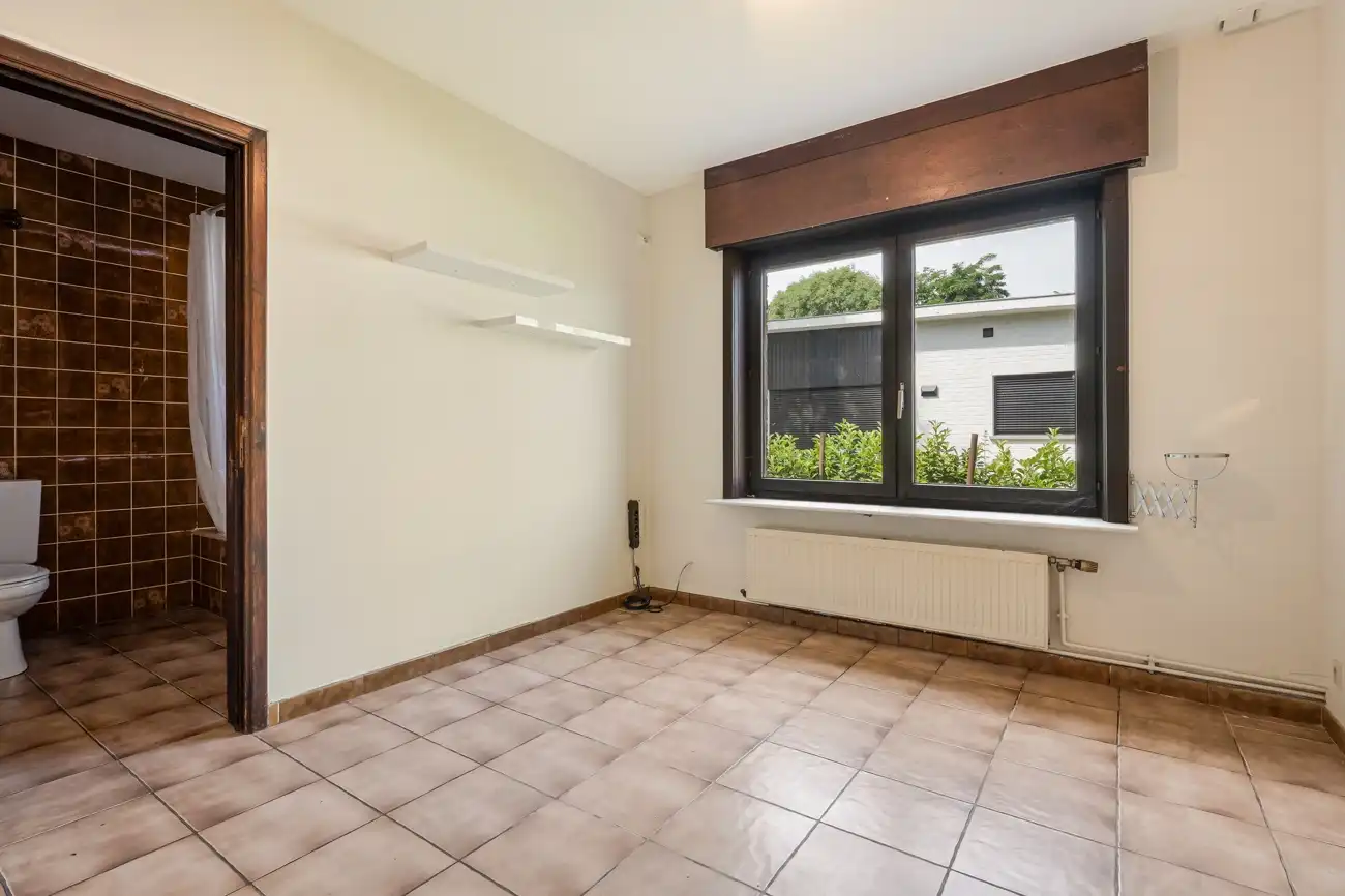 Charmante open bebouwing met 2 slaapkamers, ruime zolder op een mooie ligging dicht bij centrum Heusden foto 11
