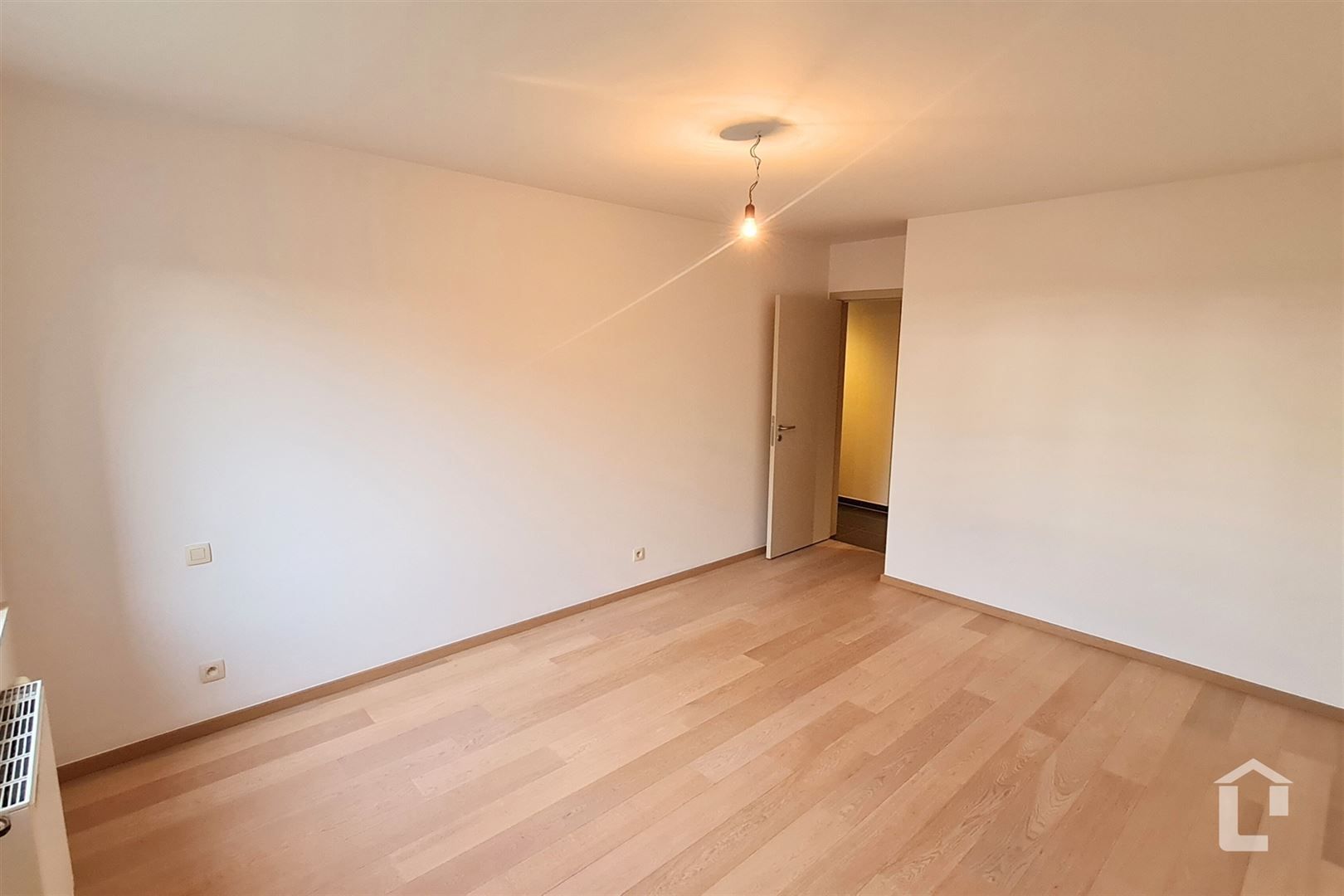 Ruim gelijkvloers appartement met eigen tuin foto 8
