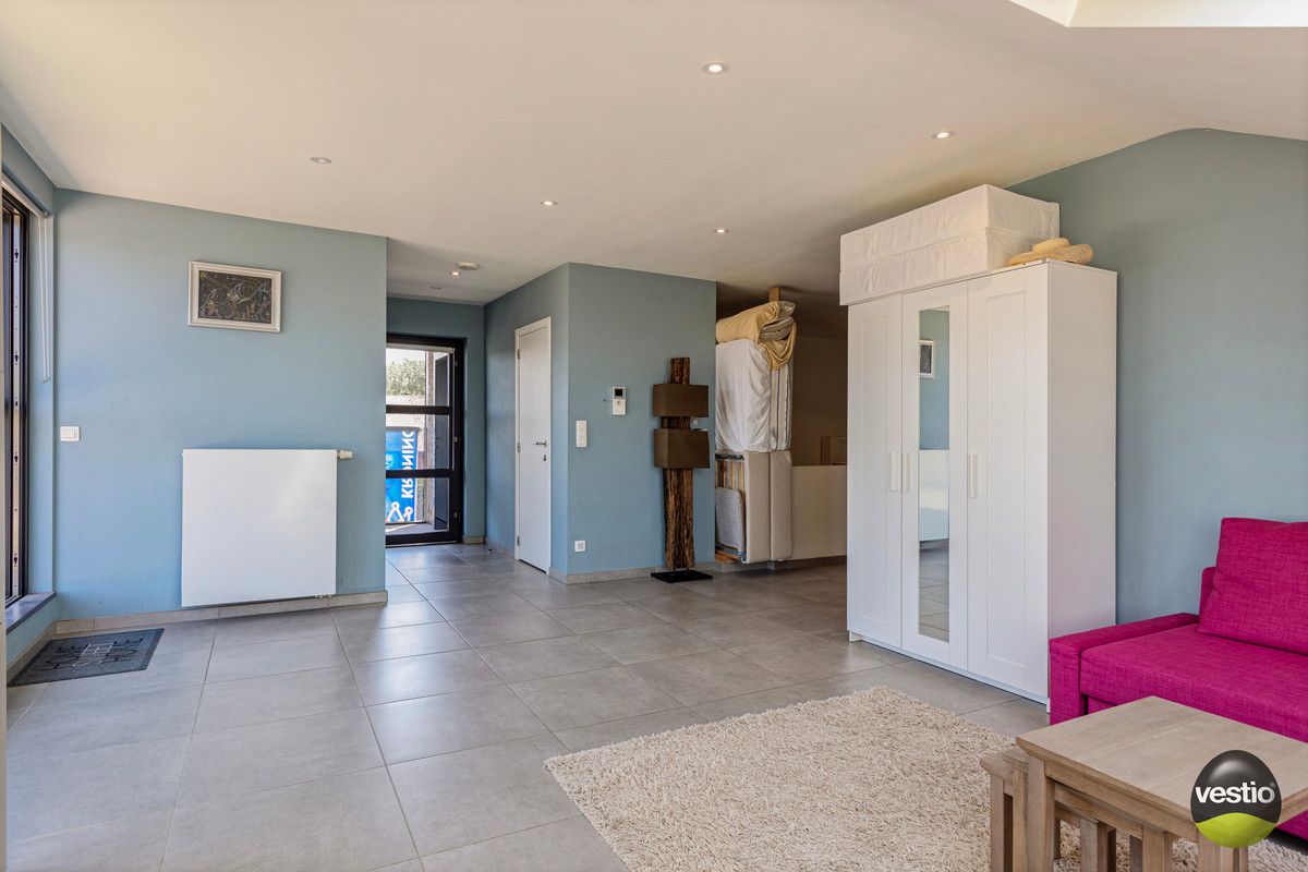 FLEXIBEL DUPLEX APPARTEMENT VAN 183M² MET 5 SLAAPKAMERS MET ZORG- EN WOONOPLOSSING NABIJ CENTRUM TONGEREN. foto 19