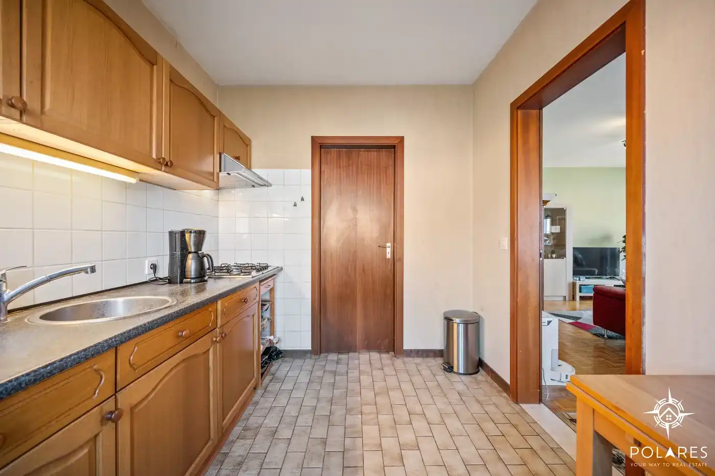Ruim gelijkvloers appartement met 2 slaapkamers, garage en kelder foto 6