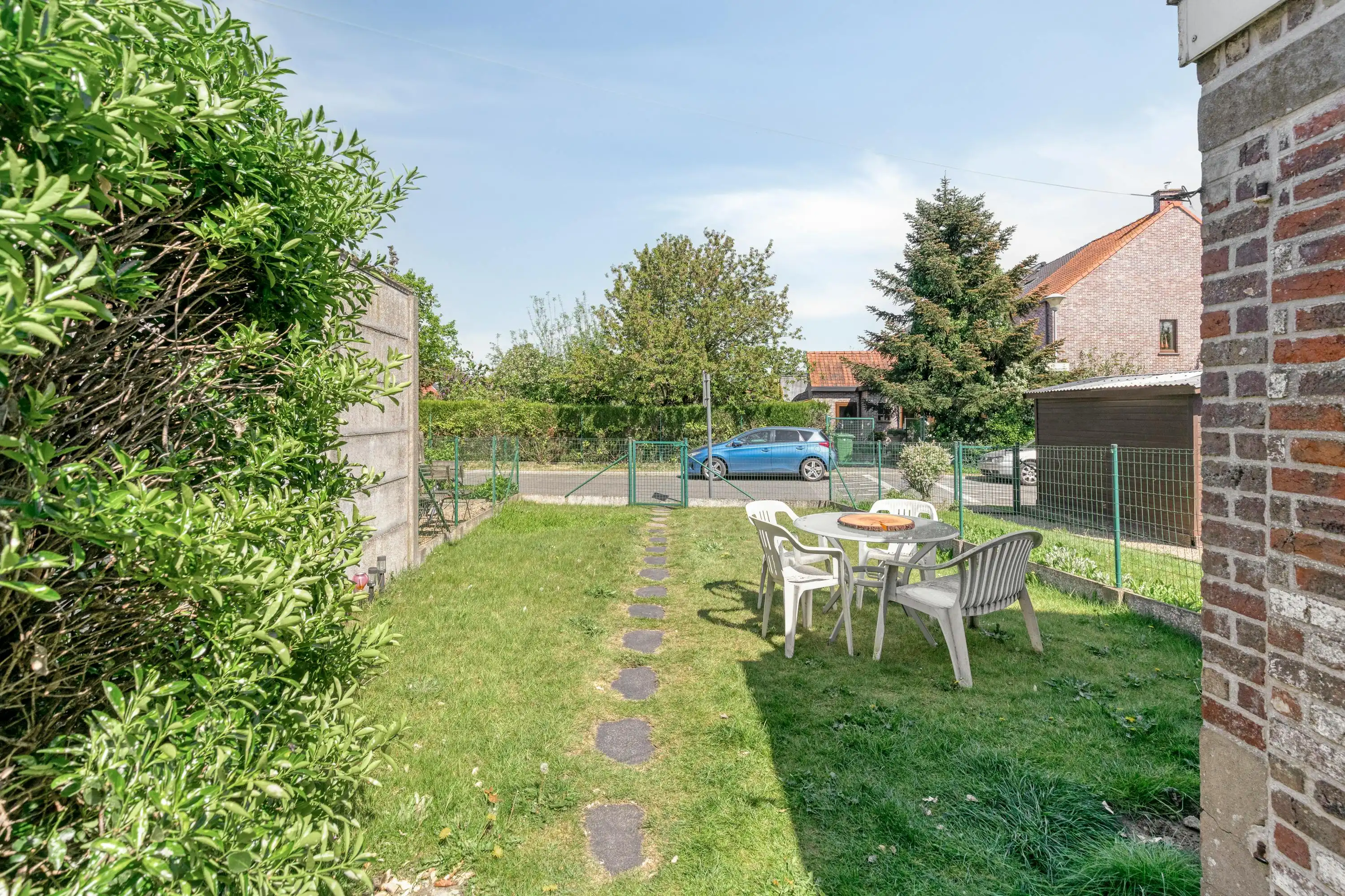 Te renoveren woning met leuke stadstuin in centrum Drongen foto 13