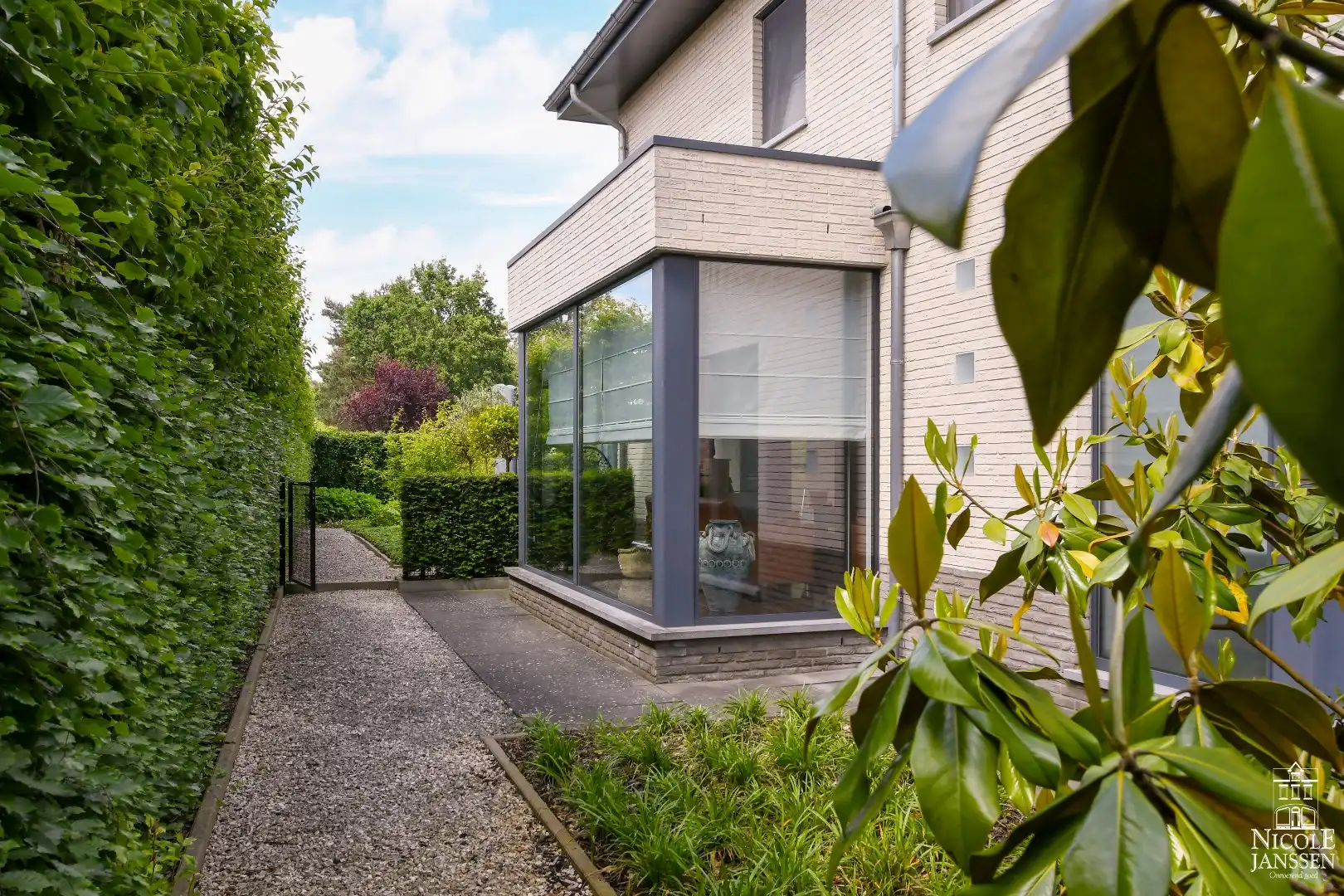 Instapklare goed onderhouden gezinswoning met mooie tuin met gezellig overdekt terras foto 29