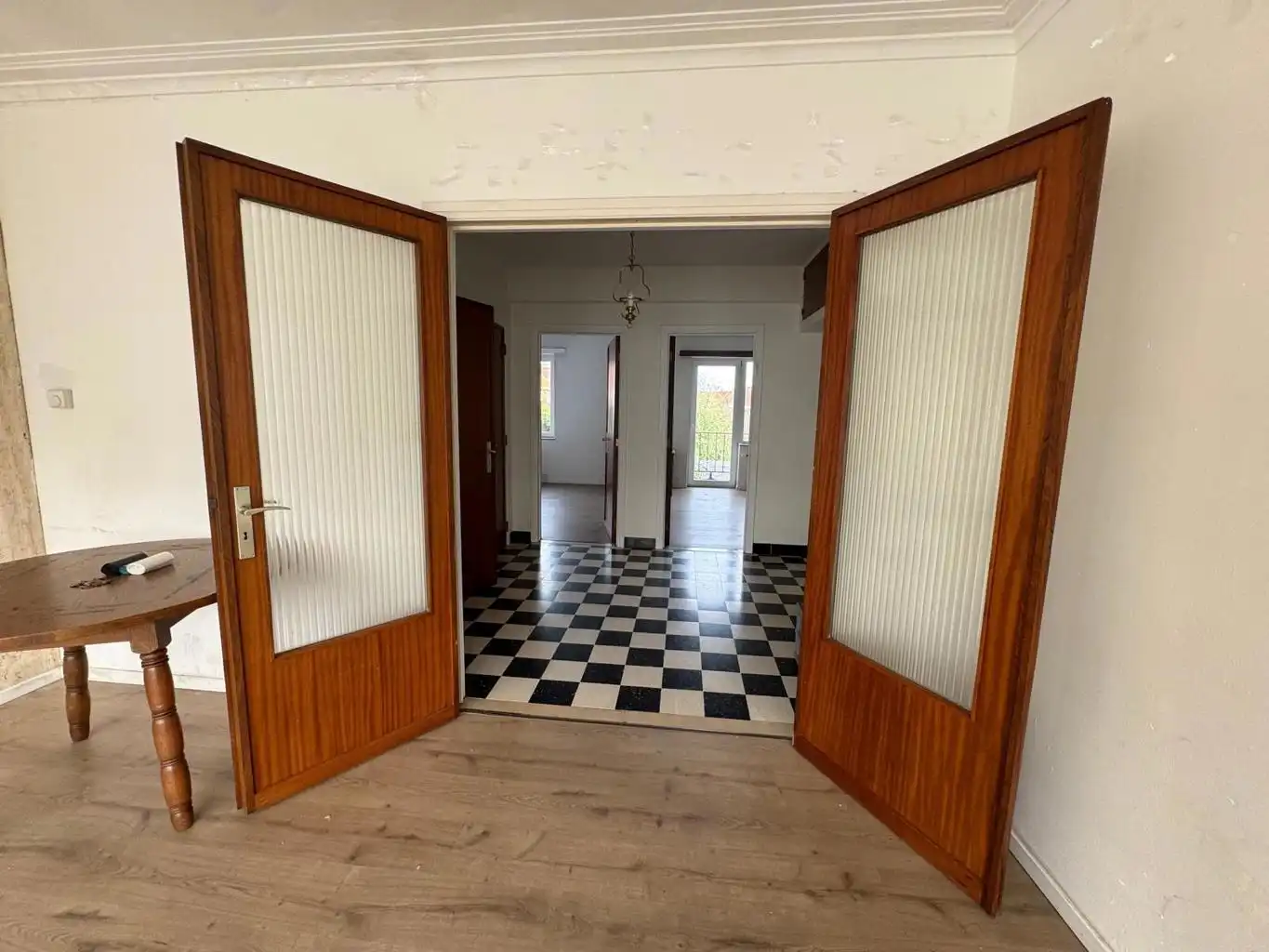 Opbrengsteigendom met 3 appartementen, tuin en 2 garages foto 10