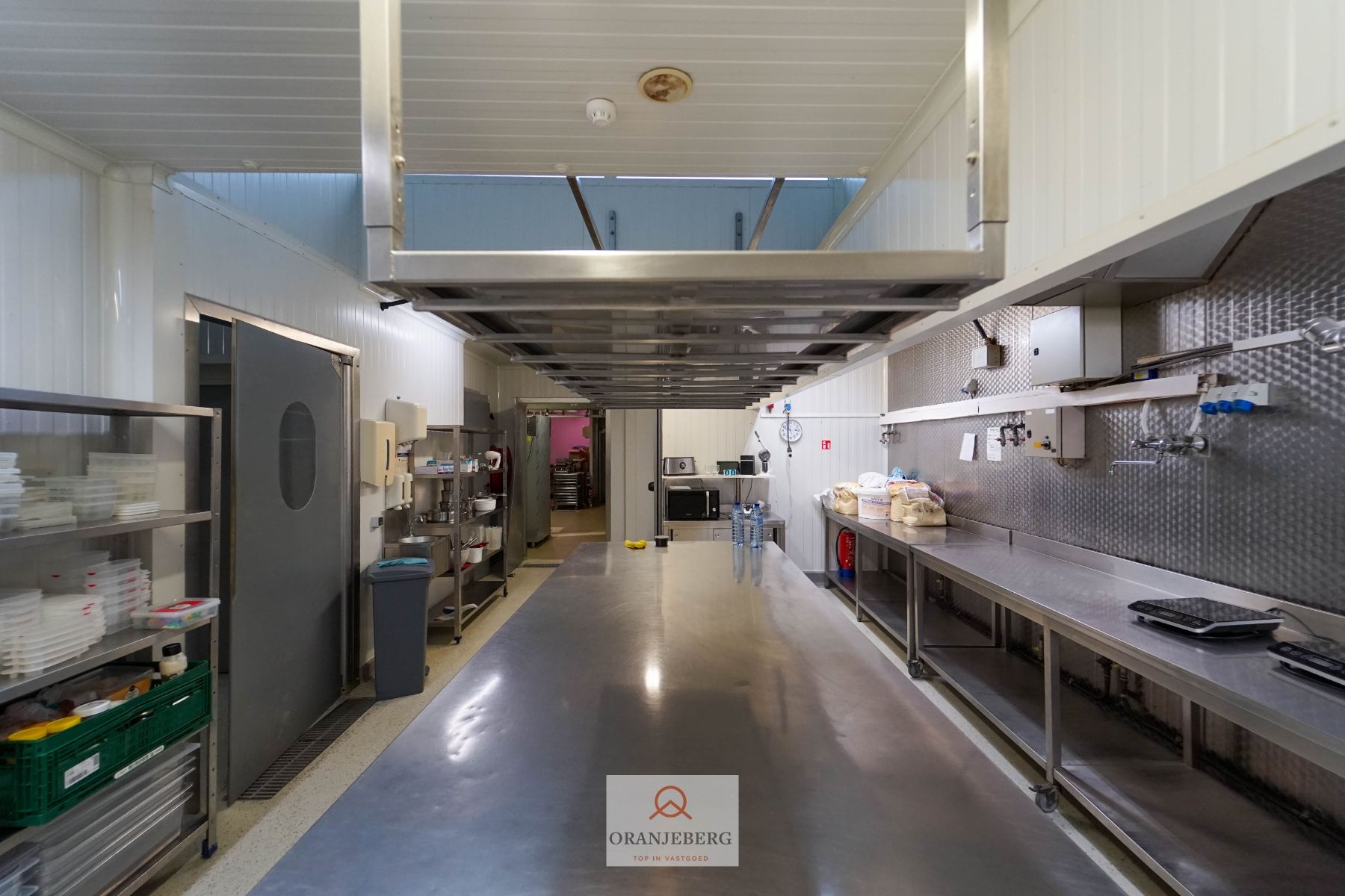 Volledig gerenoveerde winkelruimte + atelier met garage te huur in Gentbrugge foto 15