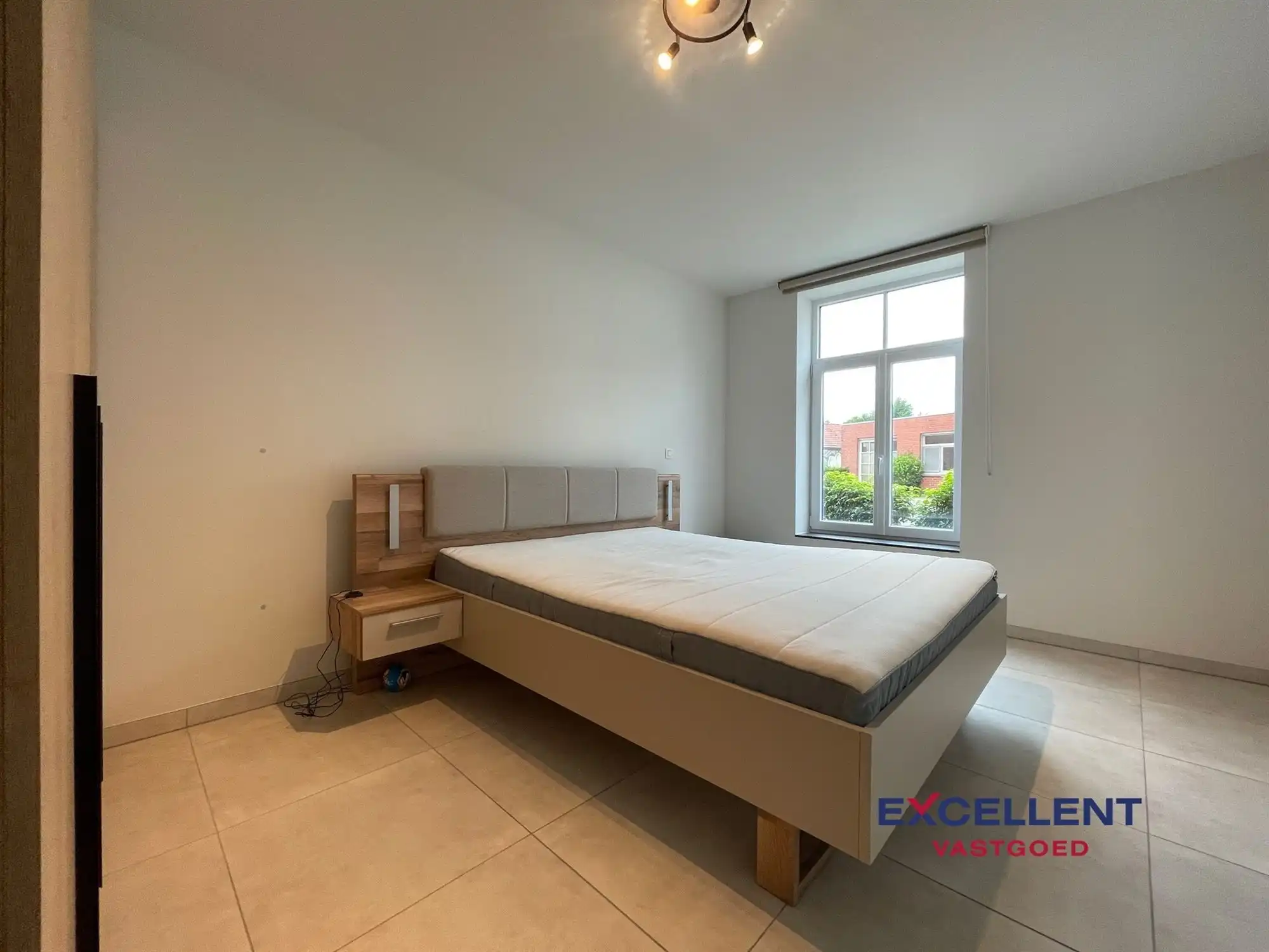 Nieuwbouw appartement met 1 slaapkamer en garage te huur in Vinkt (Deinze)! foto 9
