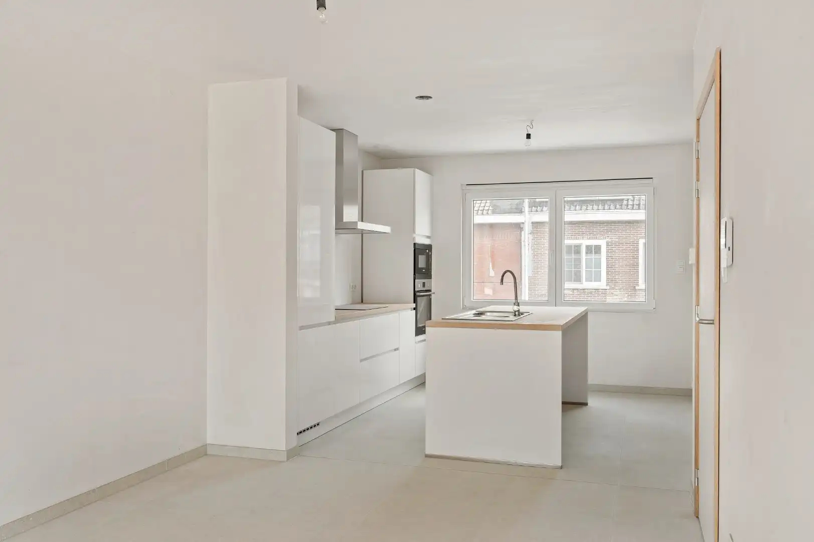 DUPLEX NIEUWBOUWAPPARTEMENT MET 2 SLPKS EN RUIM TERRAS TE GELUWE foto 7