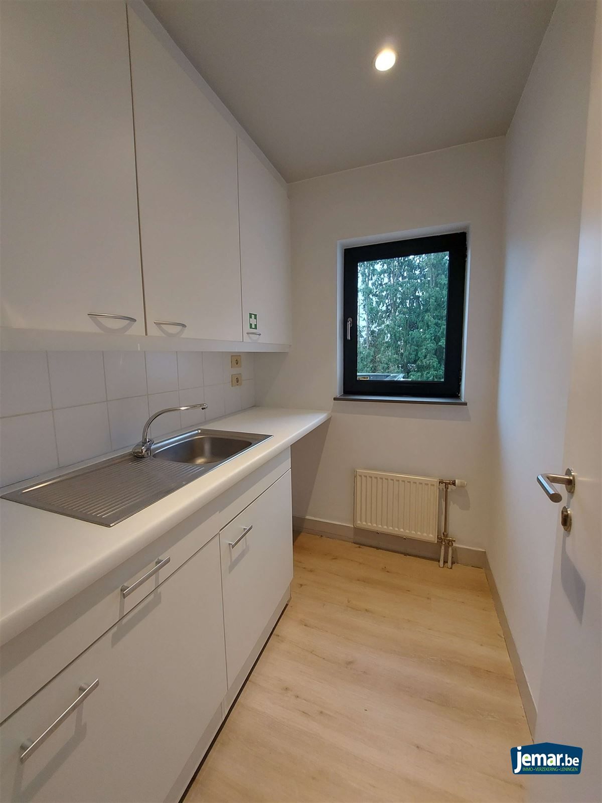 AANDELENOVERDRACHT: Handelspand met appartement foto 22