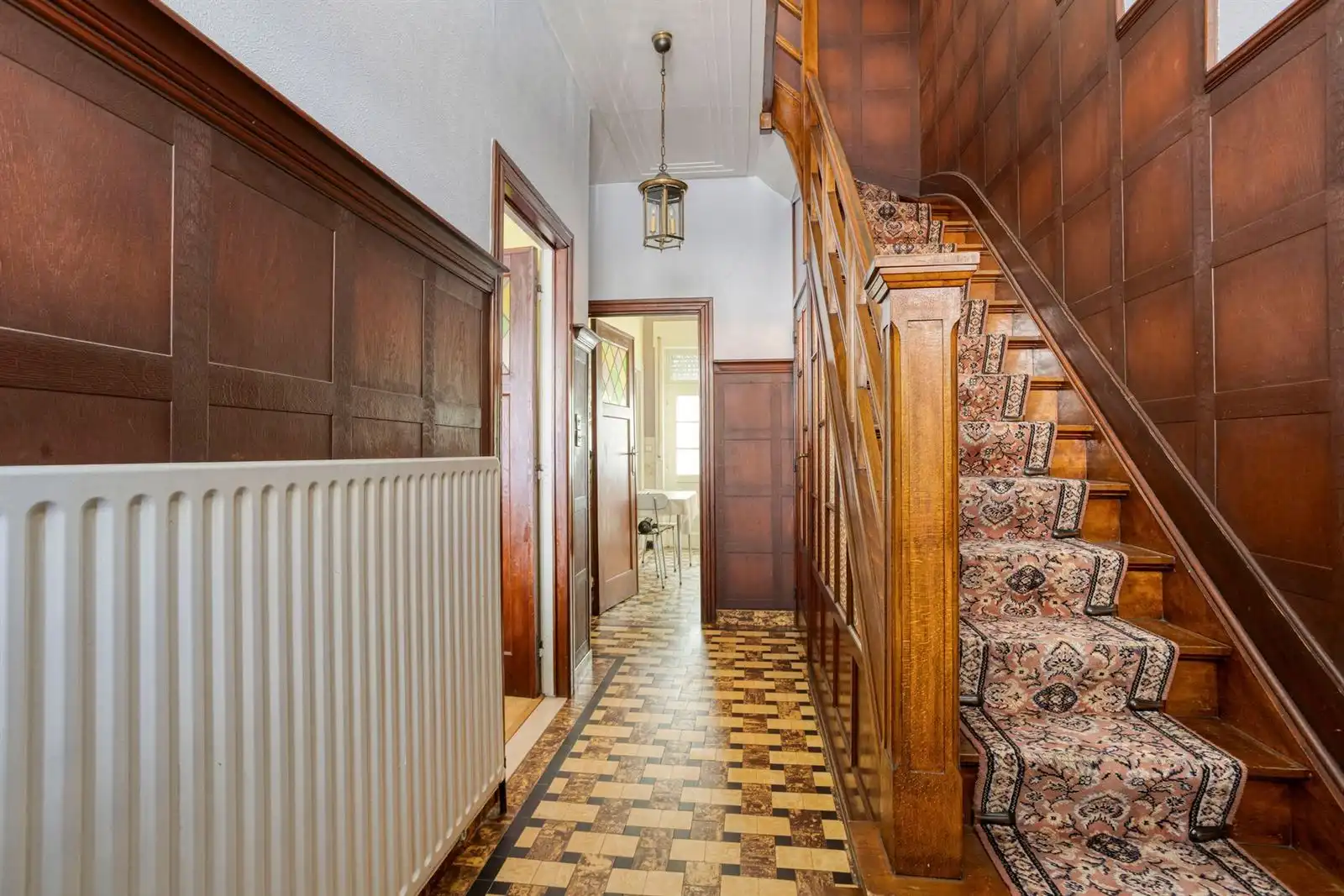 Ruime 2-gevelwoning met tuin en mogelijks 4 slaapkamers foto 4