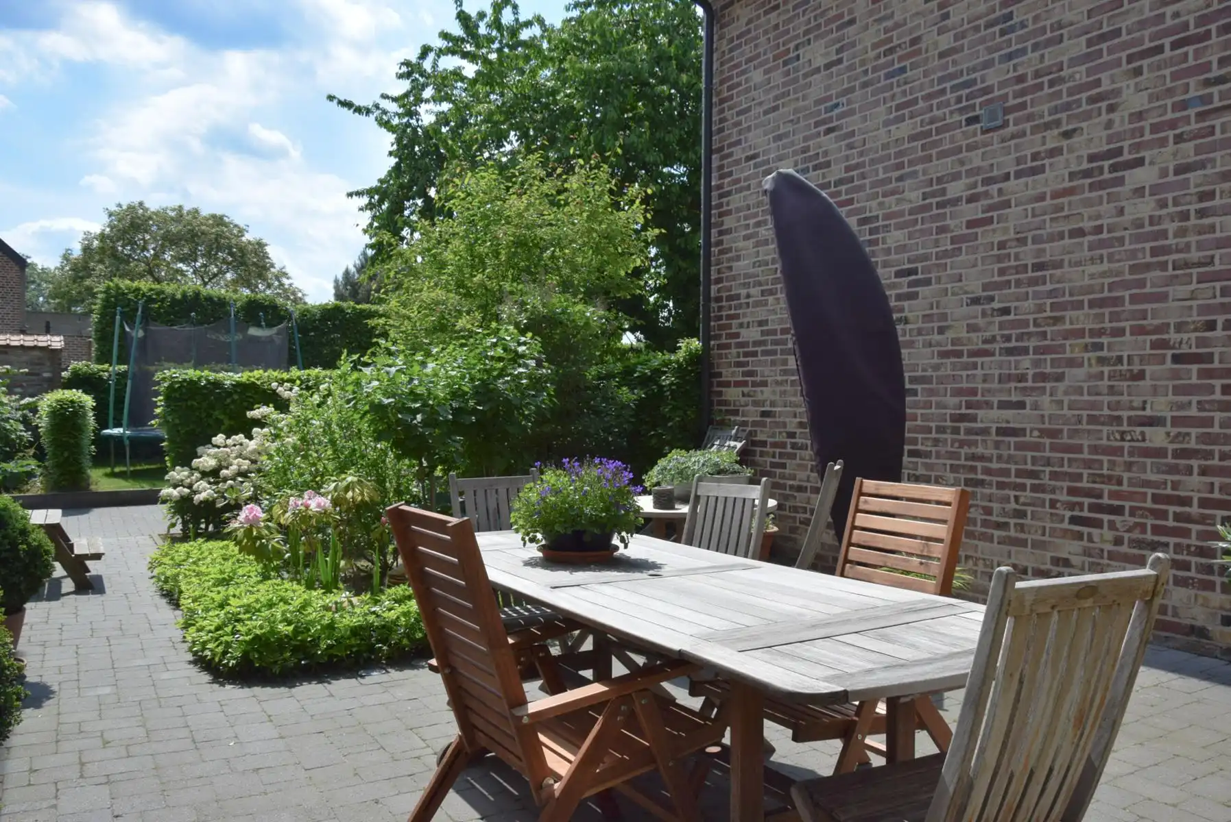 Gelijkvloers appartement met terras/tuin en garage foto 17