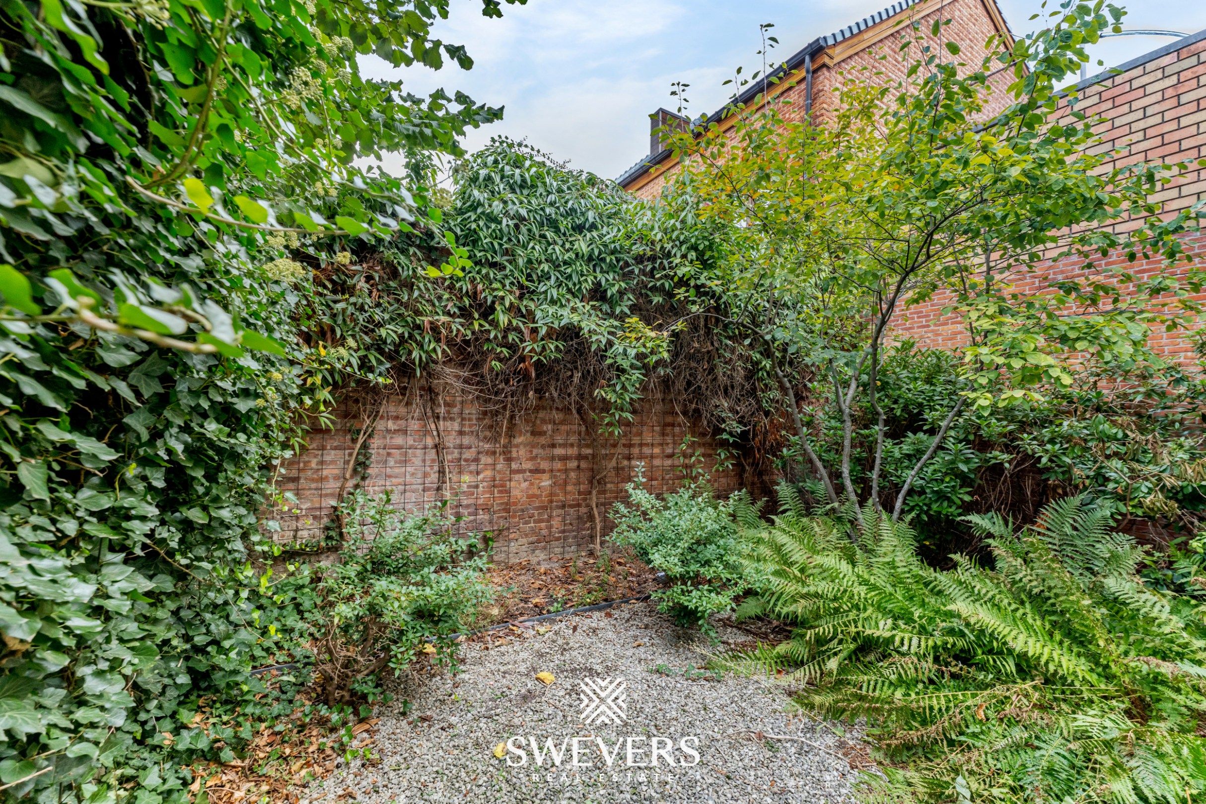 Stijlvol herenhuis met kantoorruimte en 3 slaapkamers in hartje Hasselt foto 31