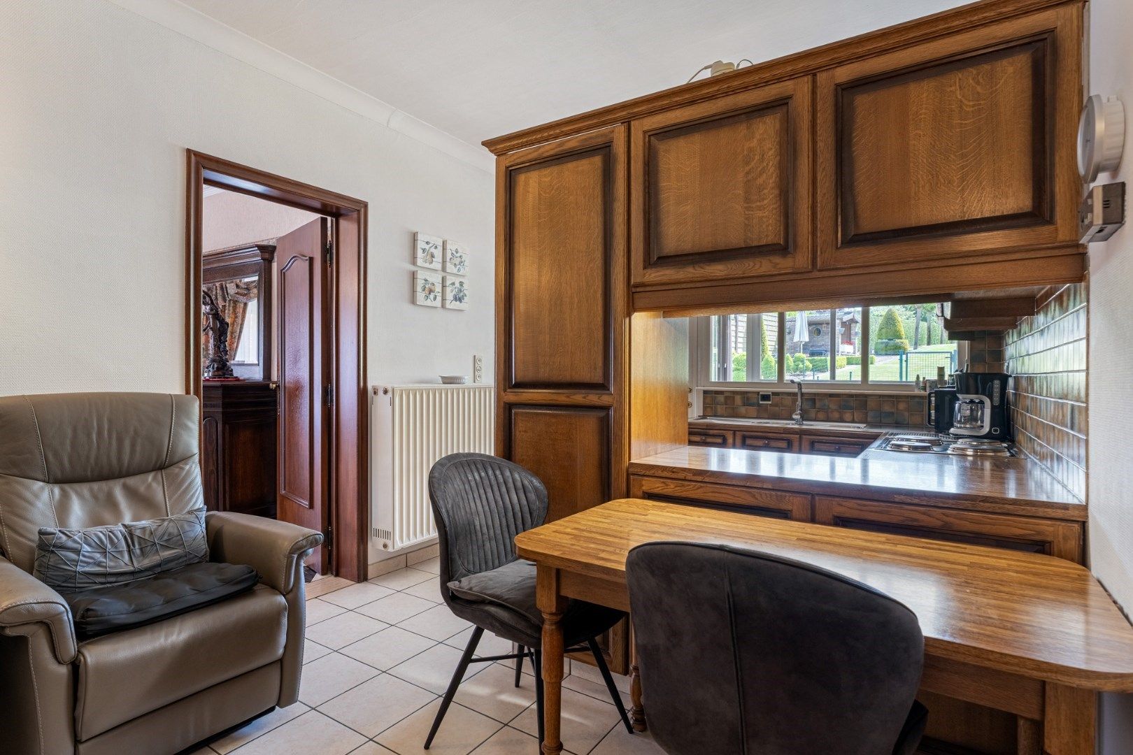 IN OPTIE - Verzorgde vrijstaande woning met mooie tuin op 11a 58ca, op enkele minuutjes van het centrum  foto 6