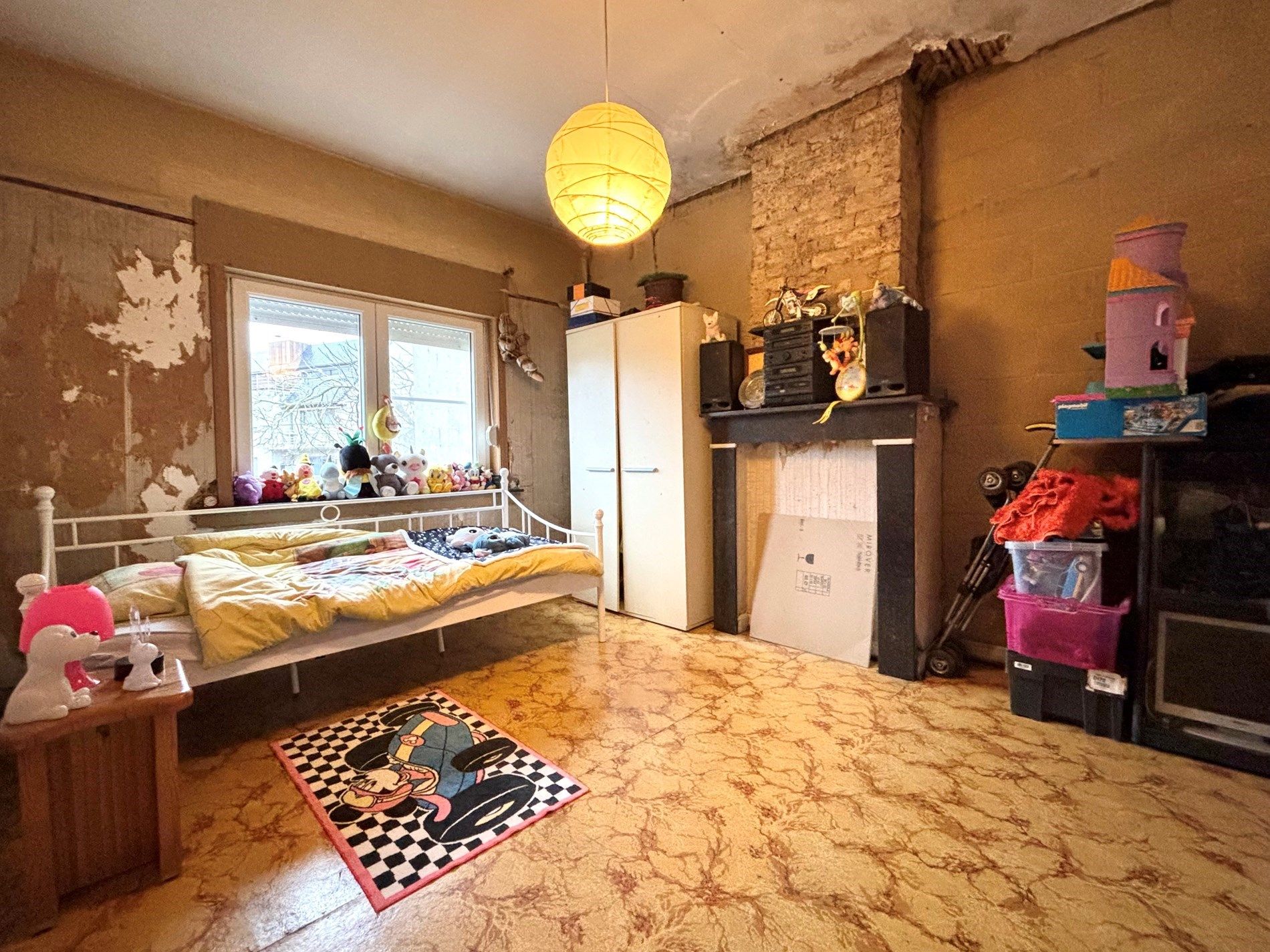 Op te frissen rijwoning met tuin, vernieuwde ramen en geïsoleerd dak. foto 14