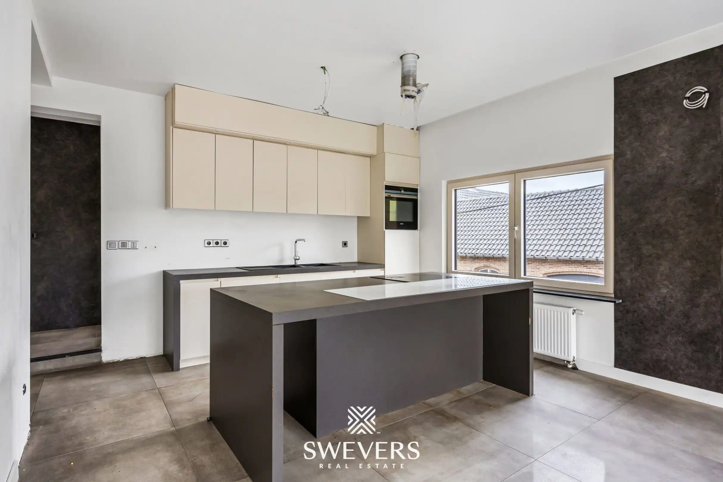 Ruim appartement met gemeenschappelijke tuin te Lummen foto 6