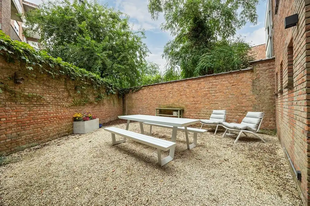 Instapklaar appartement met ruime tuin foto 11