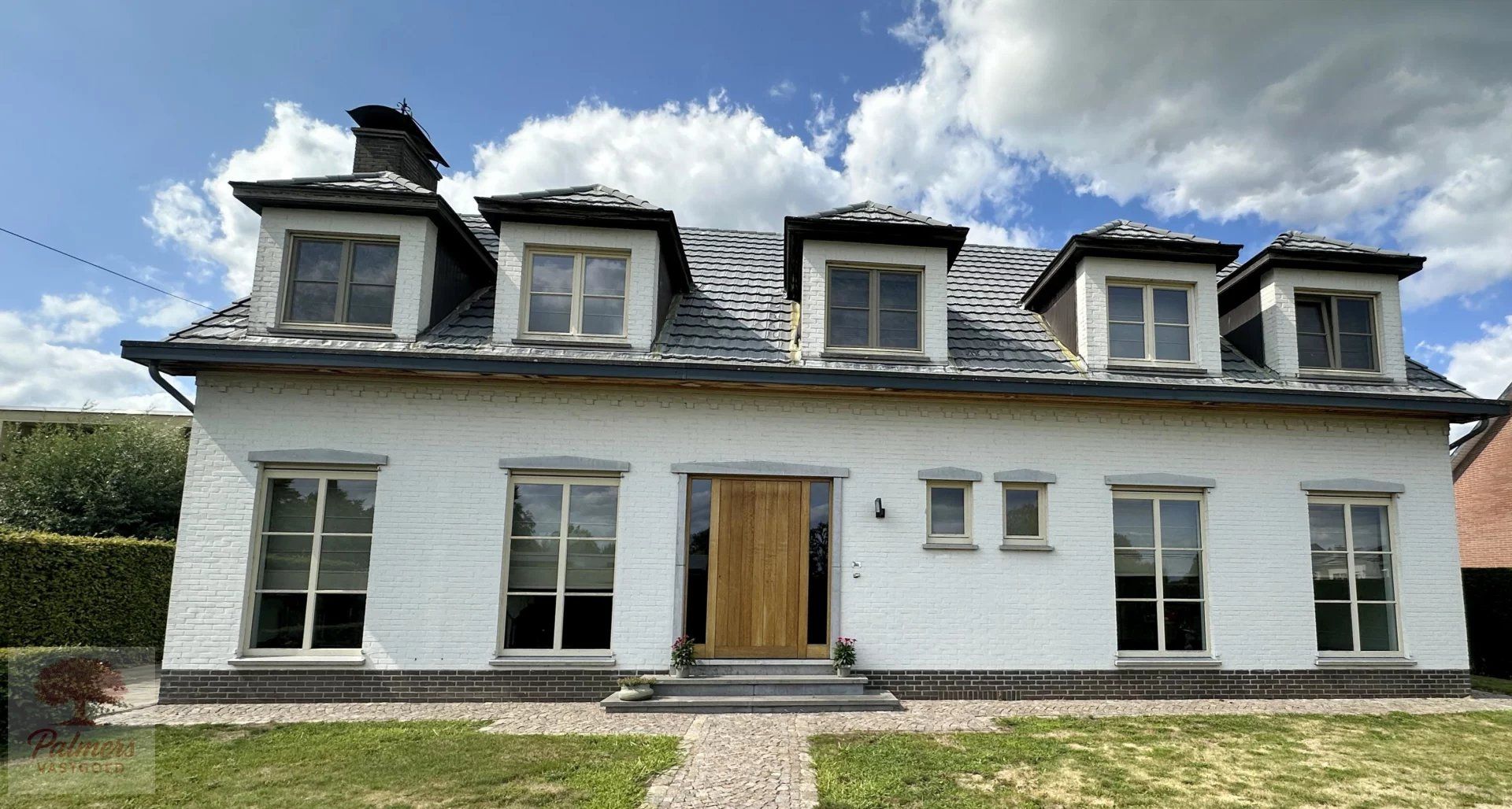 Discreet gelegen villa met karakter en comfort in hartje Alken foto 3