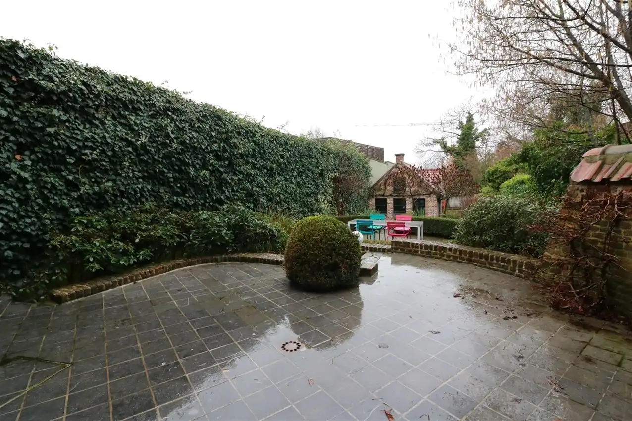 Voormalige patriciërswoning met 3 slpk., prachtige tuin en garage foto 26