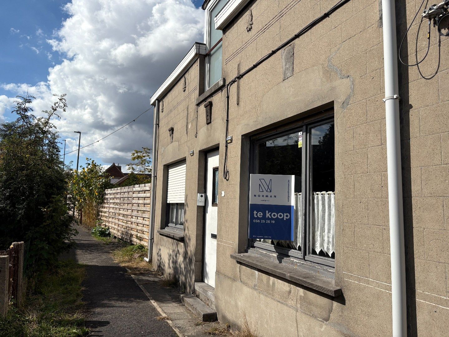 Hoofdfoto van de publicatie: Renovatiewoning te koop in Kuurne – rustig gelegen!