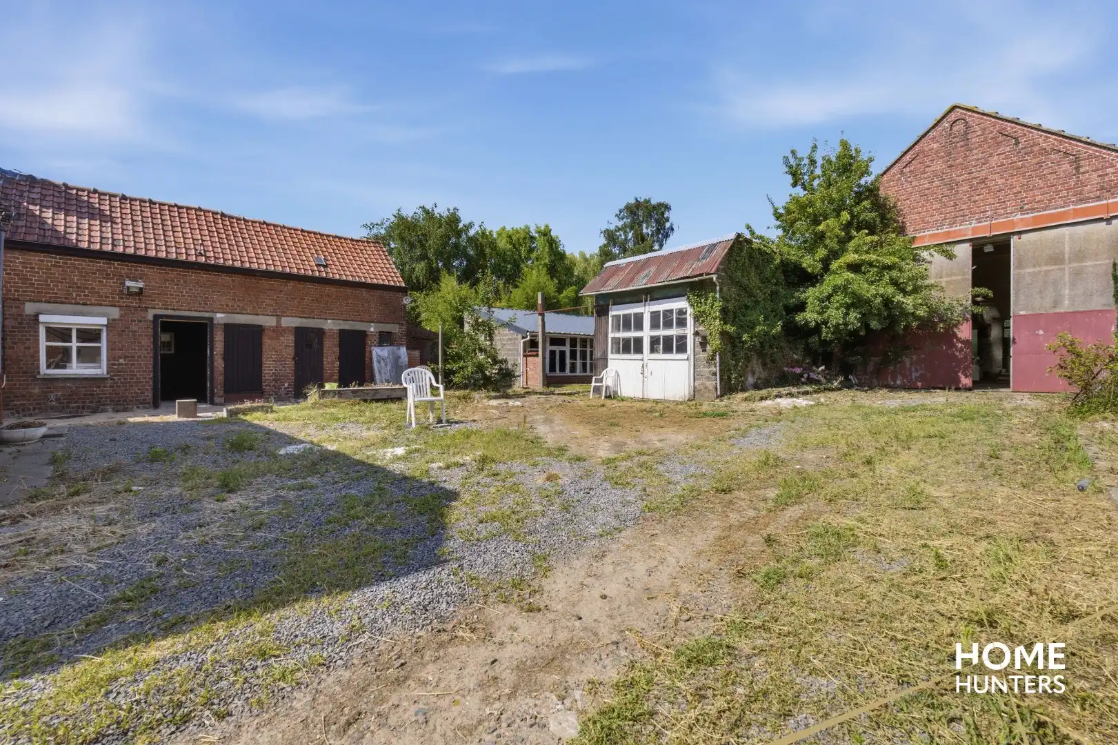 Veelzijdige eigendom met te renoveren woning en twee ruime loodsen in Langemark foto 20
