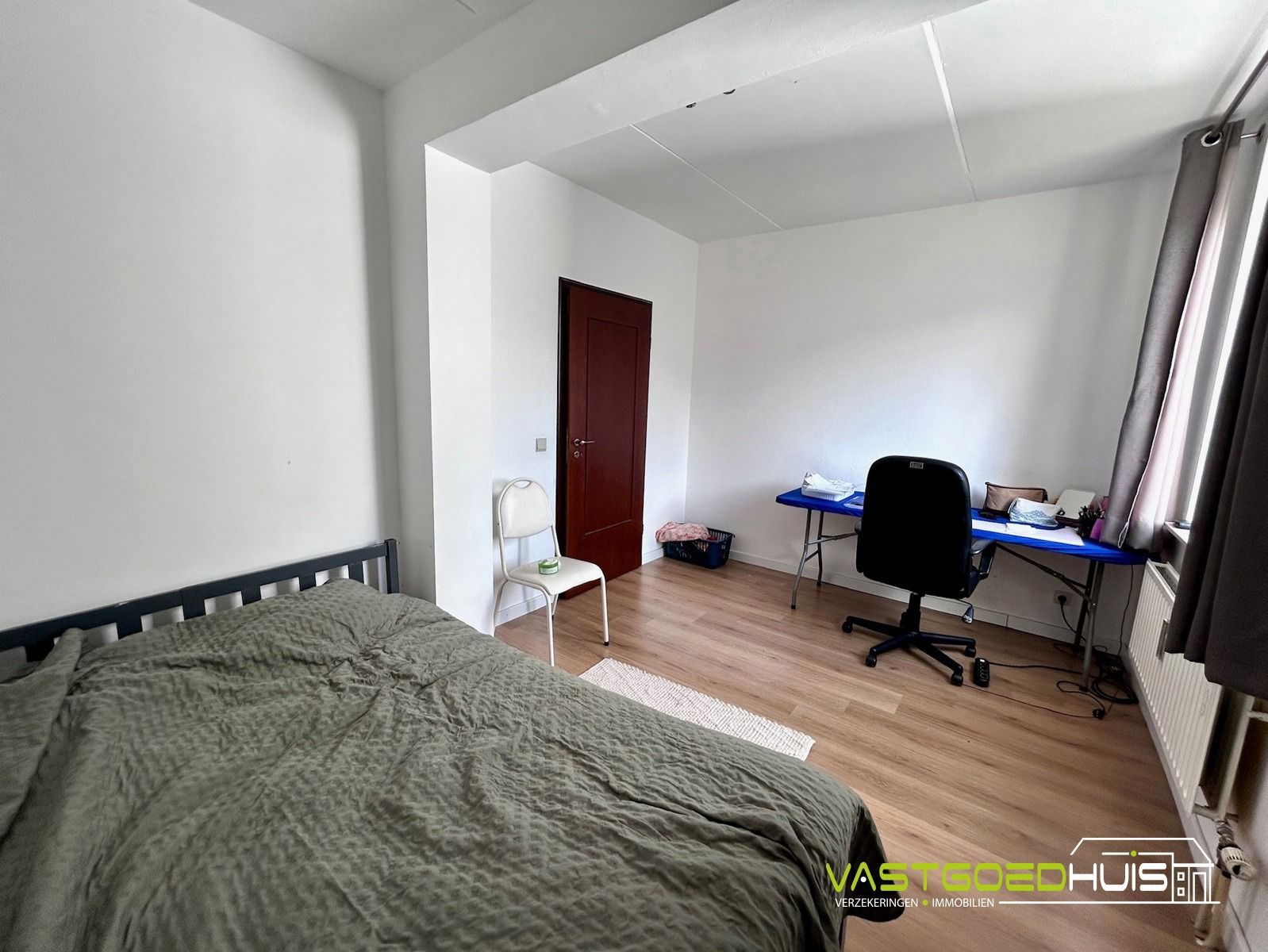 Ruim, gelijkvloers appartement met terras foto 16