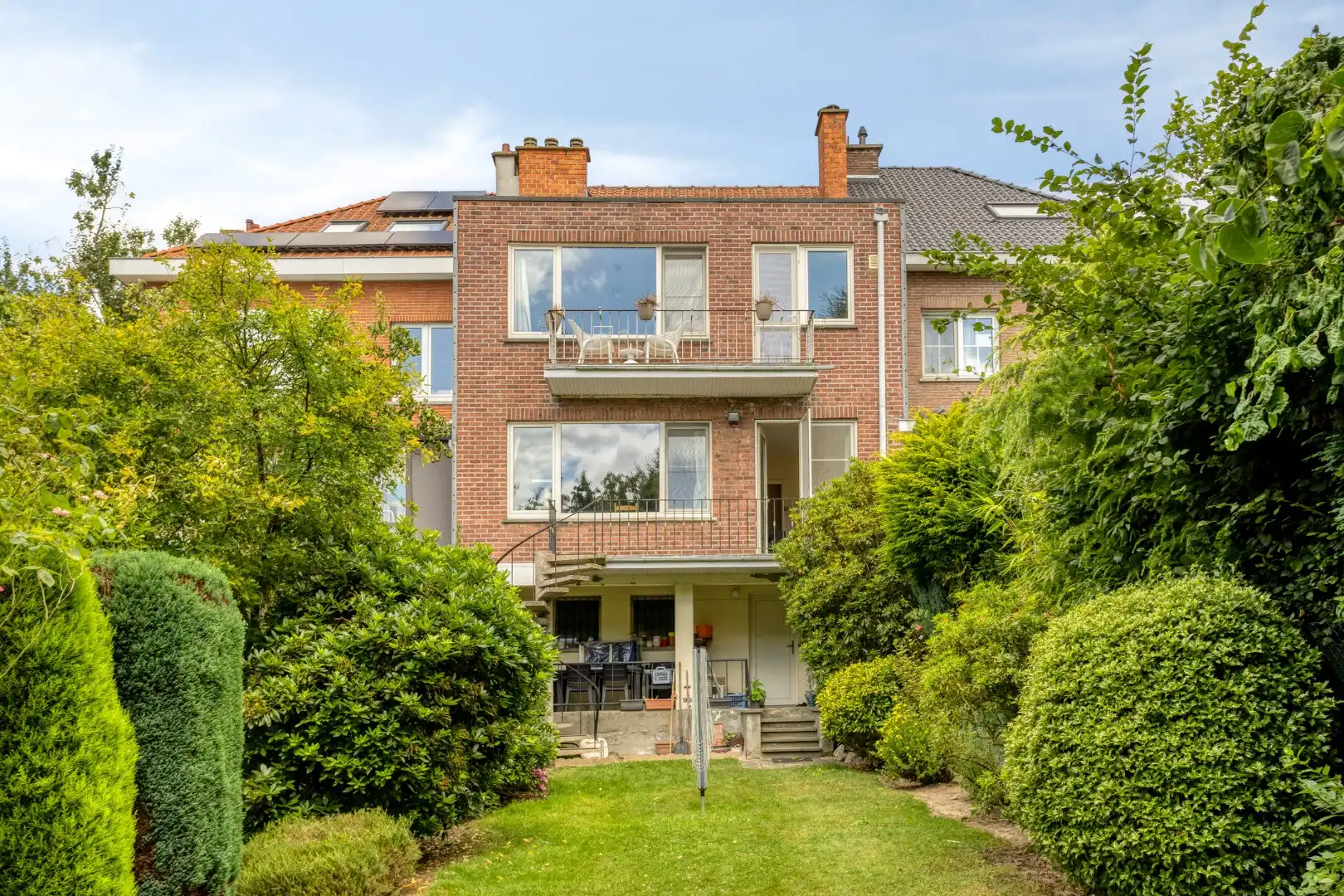 Opbrengsteigendom met tuin en 2 verhuurde appartementen in Wemmel foto 26